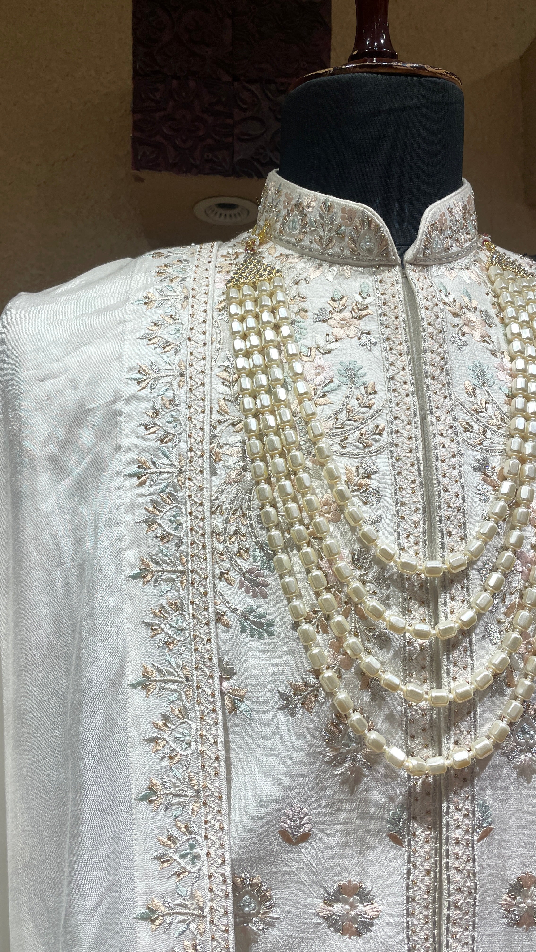Ivory silk sherwani with floral motifs