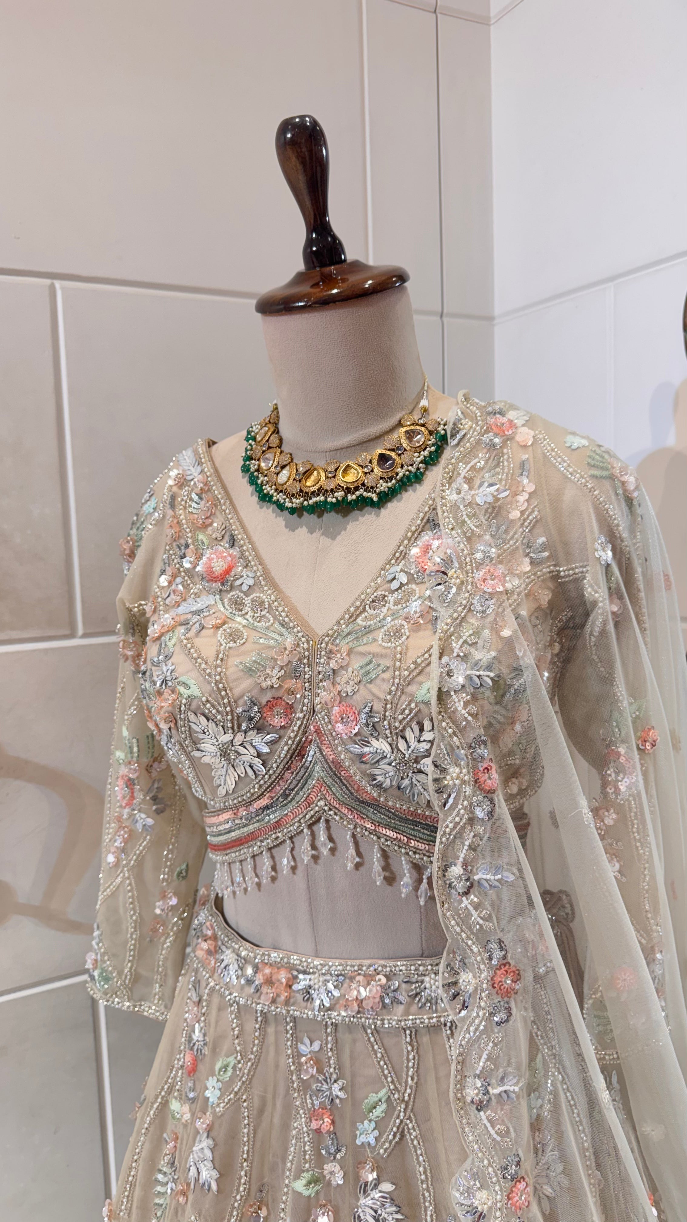 Gold lehenga with multicolor embroidery