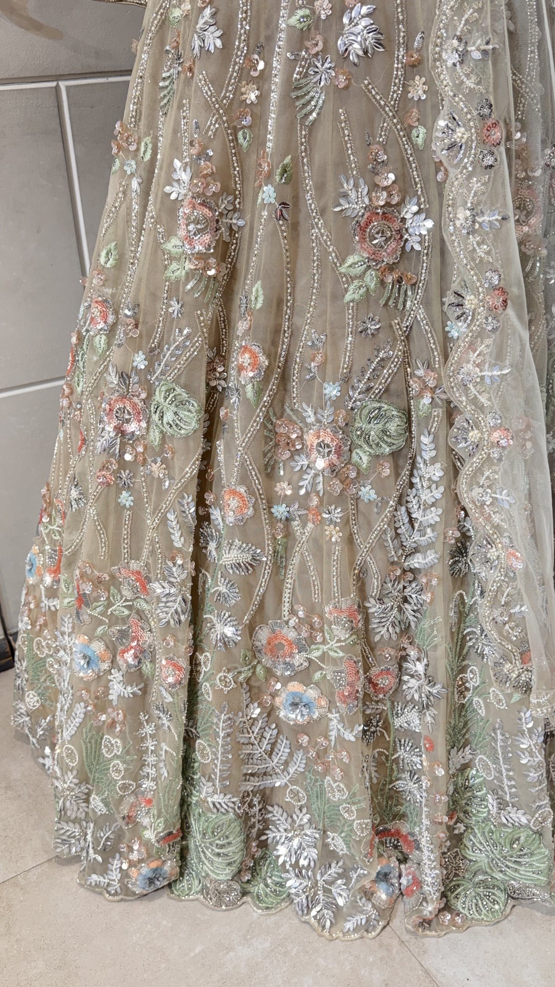 Gold lehenga with multicolor embroidery