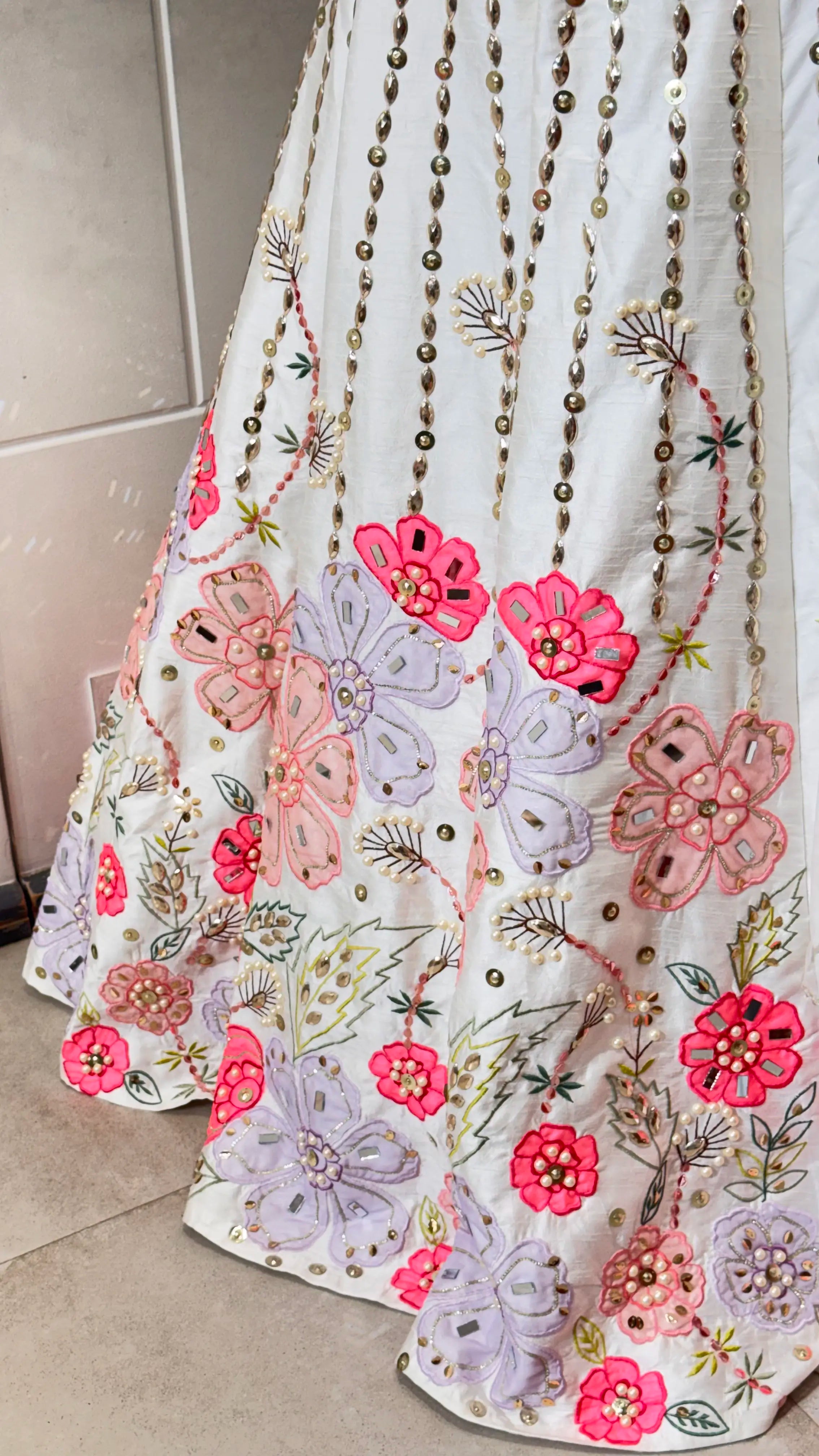 White lehenga with floral embroidery