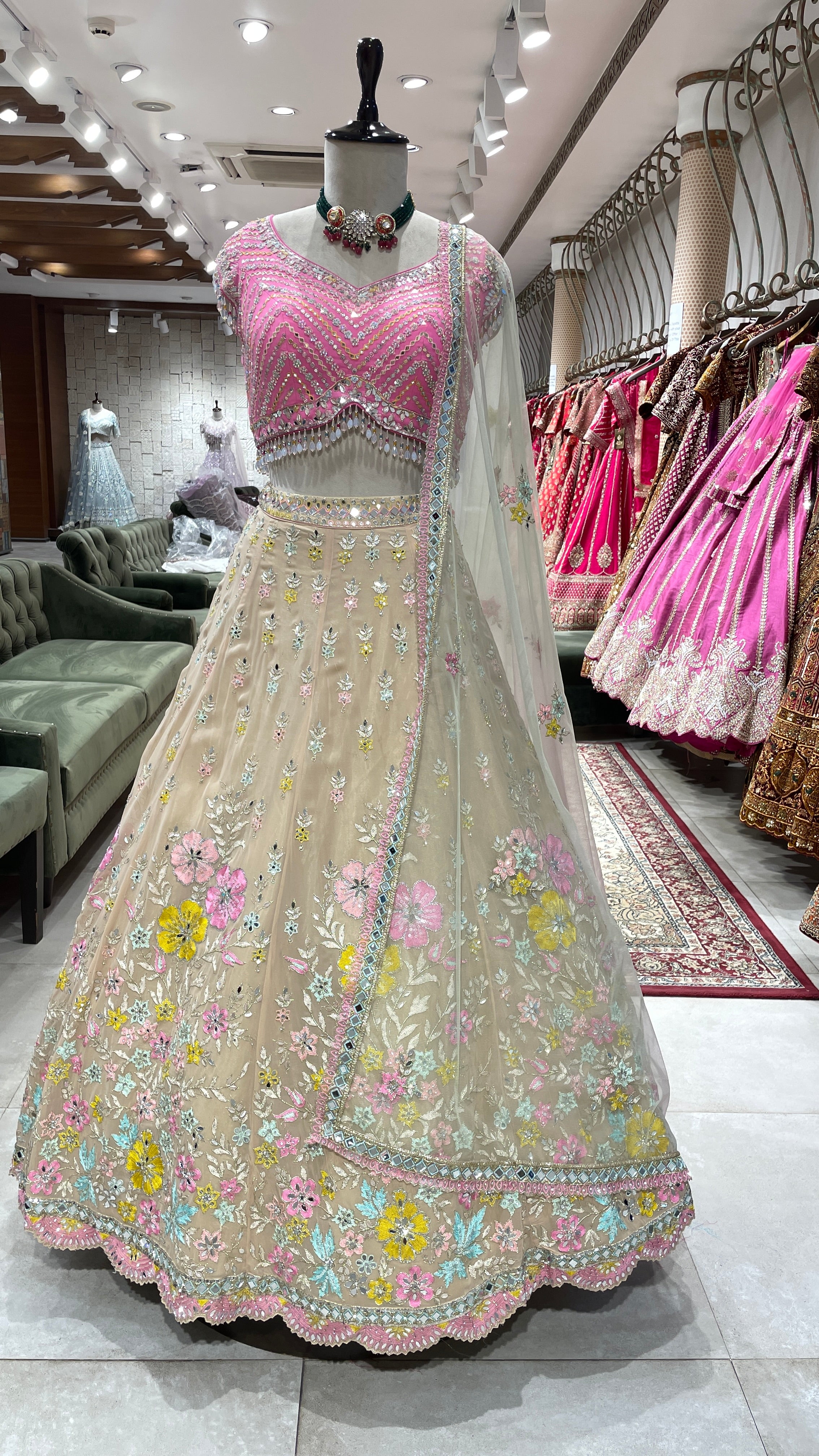 Gold Georgette multicoloured lehenga with floral motifs