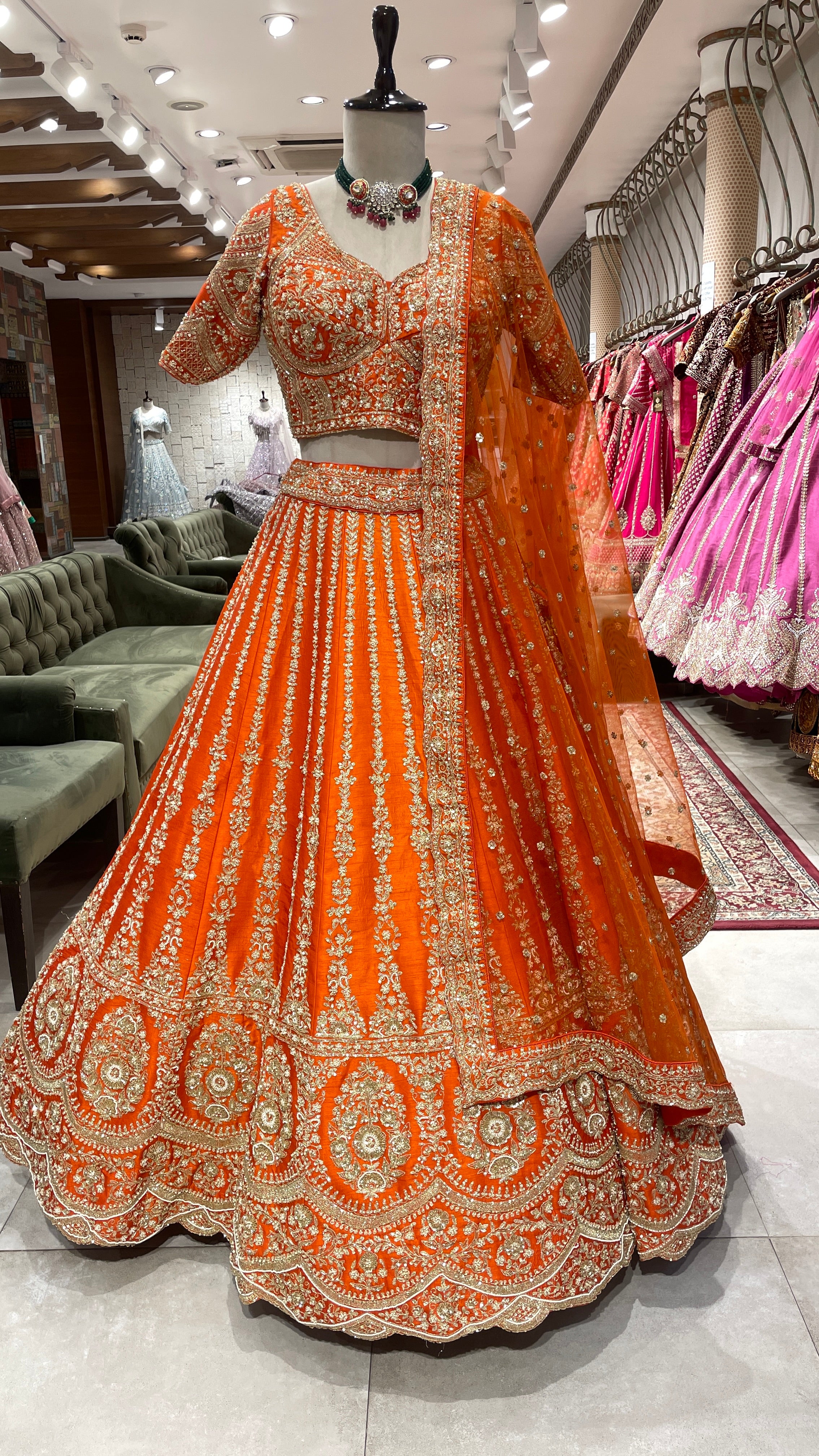 Orange bridal silk lehenga with zariwork