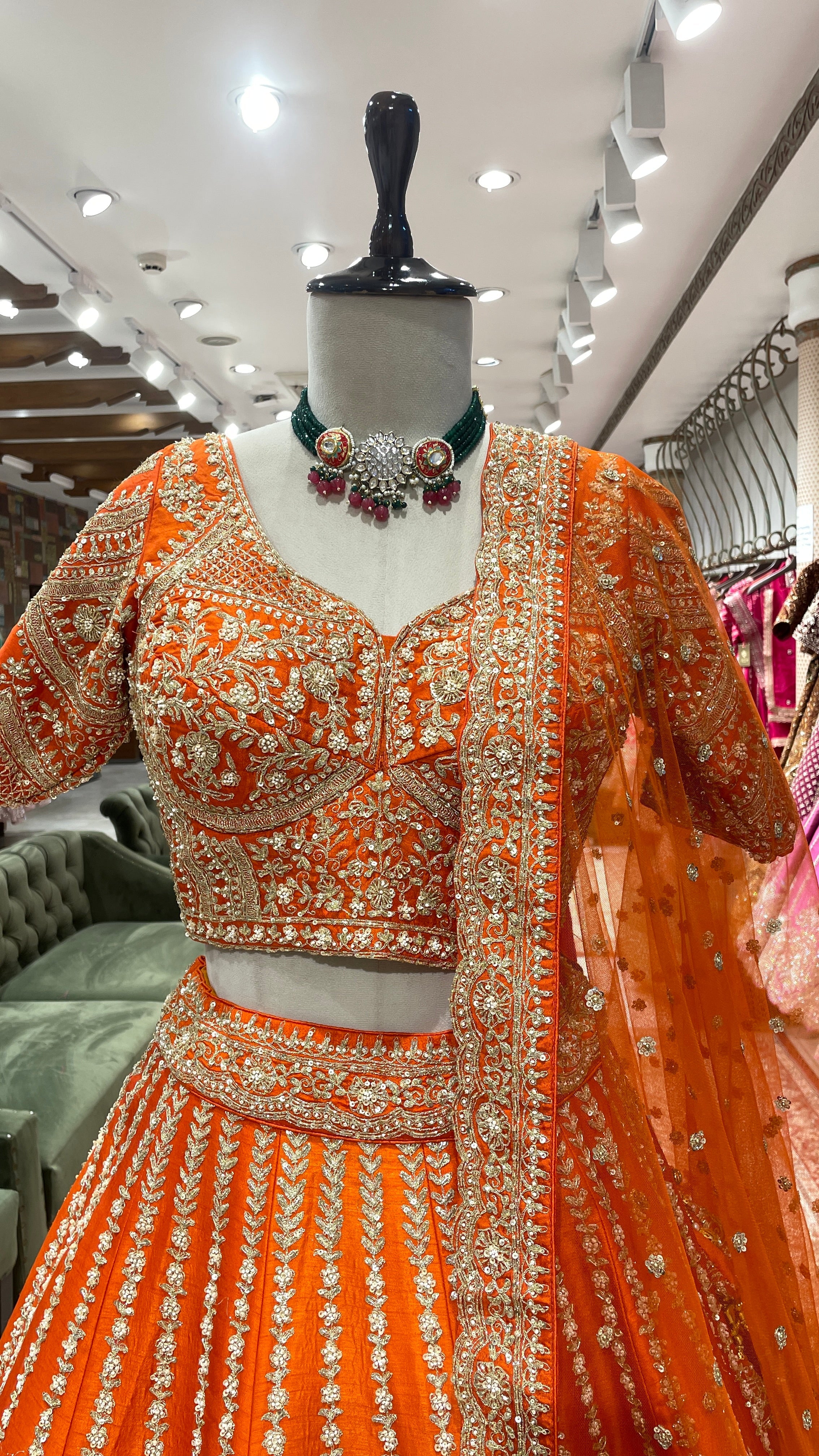 Orange bridal silk lehenga with zariwork