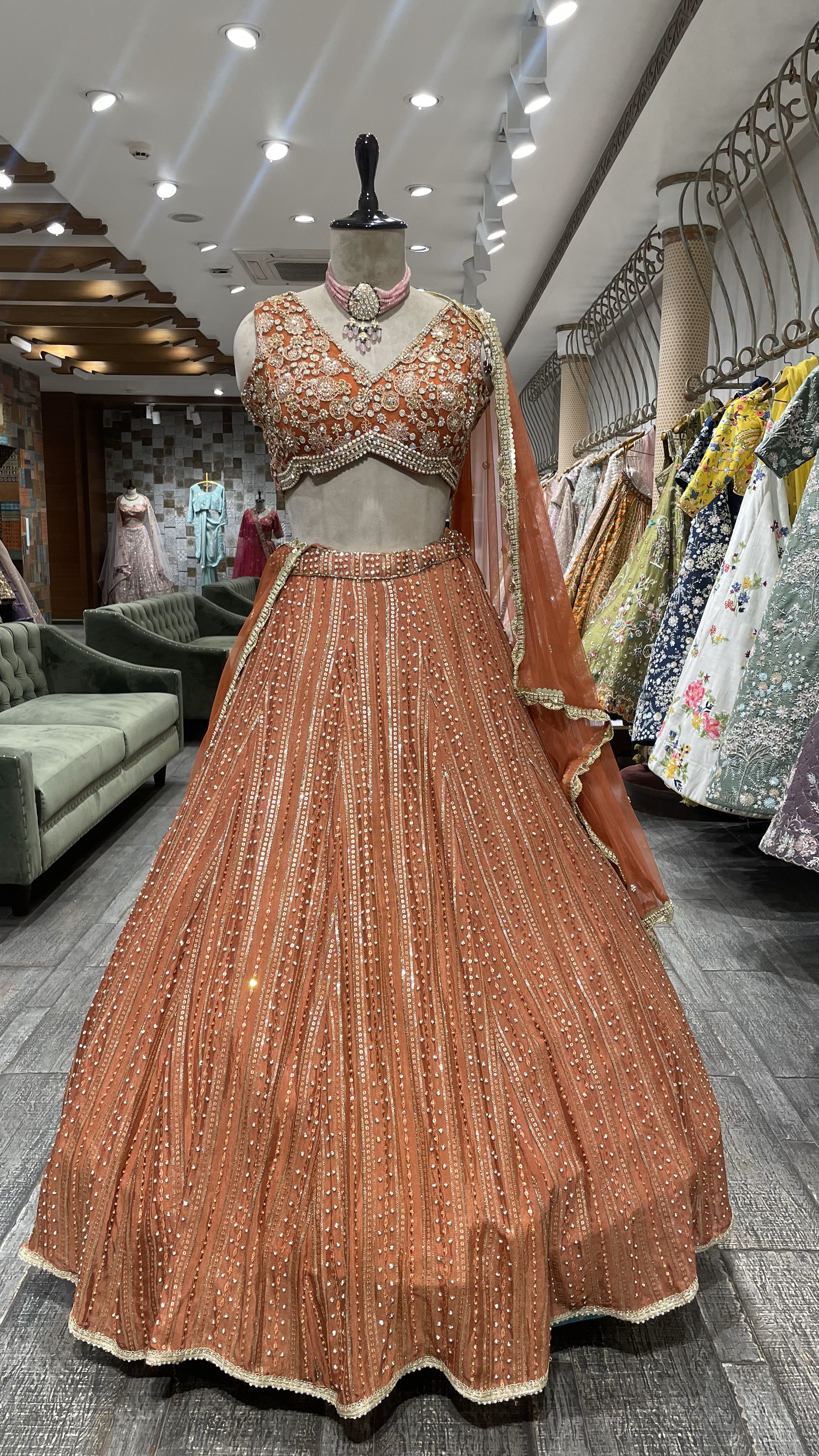 Rust Chinon Lehenga with pearl sequins and pot embellishments