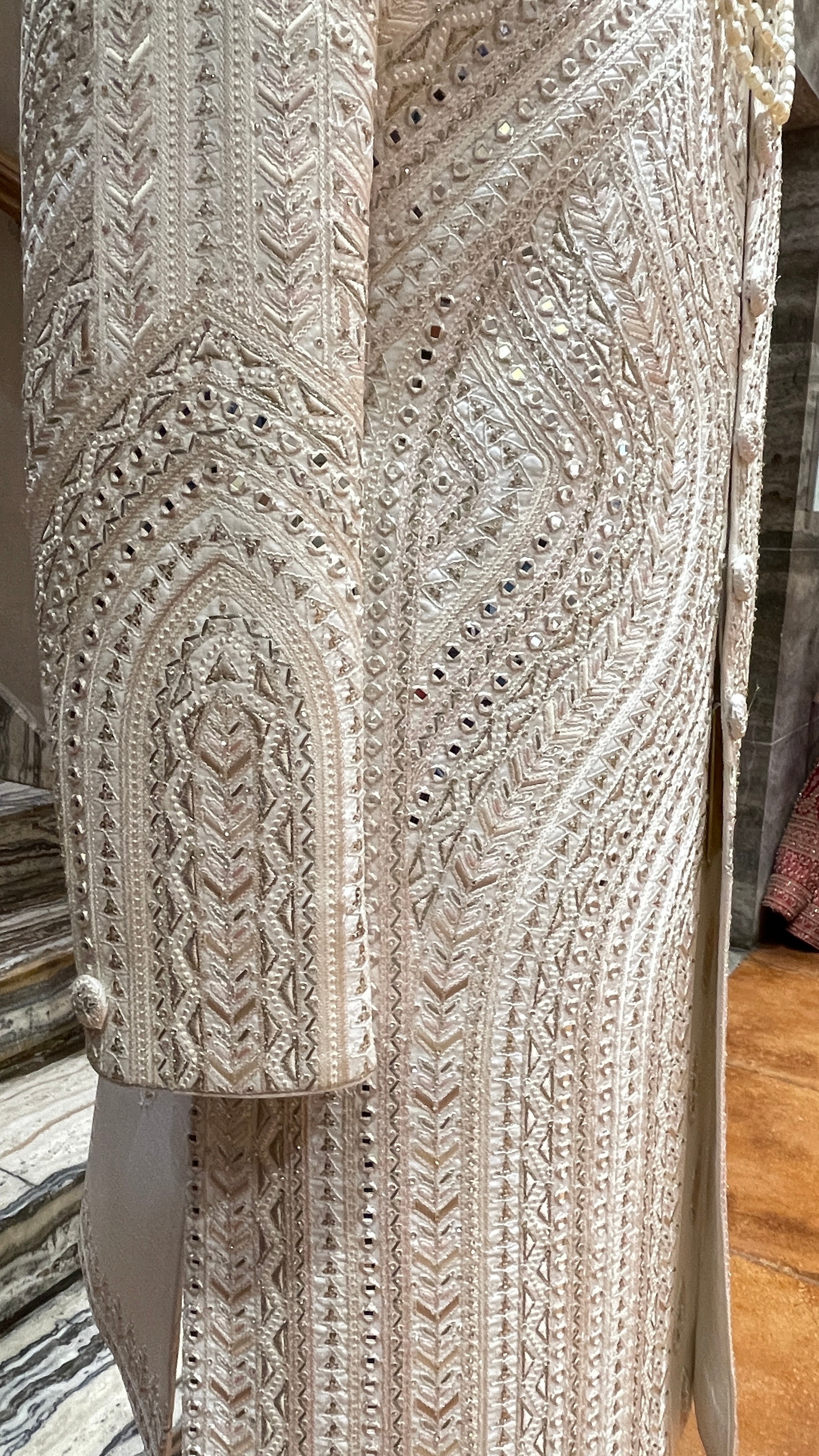 Ivory silk sherwani with mirrorwork