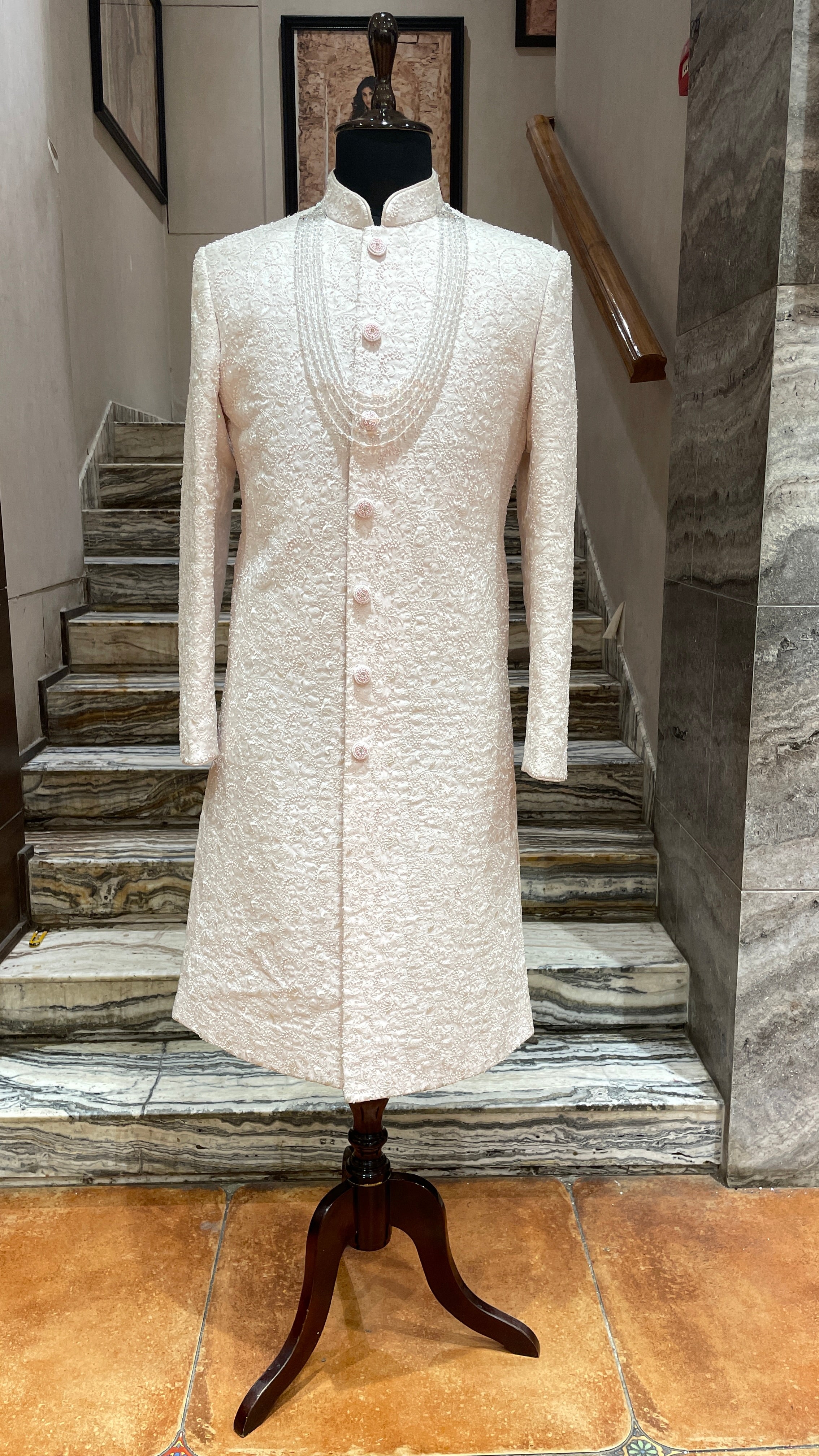 Ivory sherwani with pastel pink beadwork