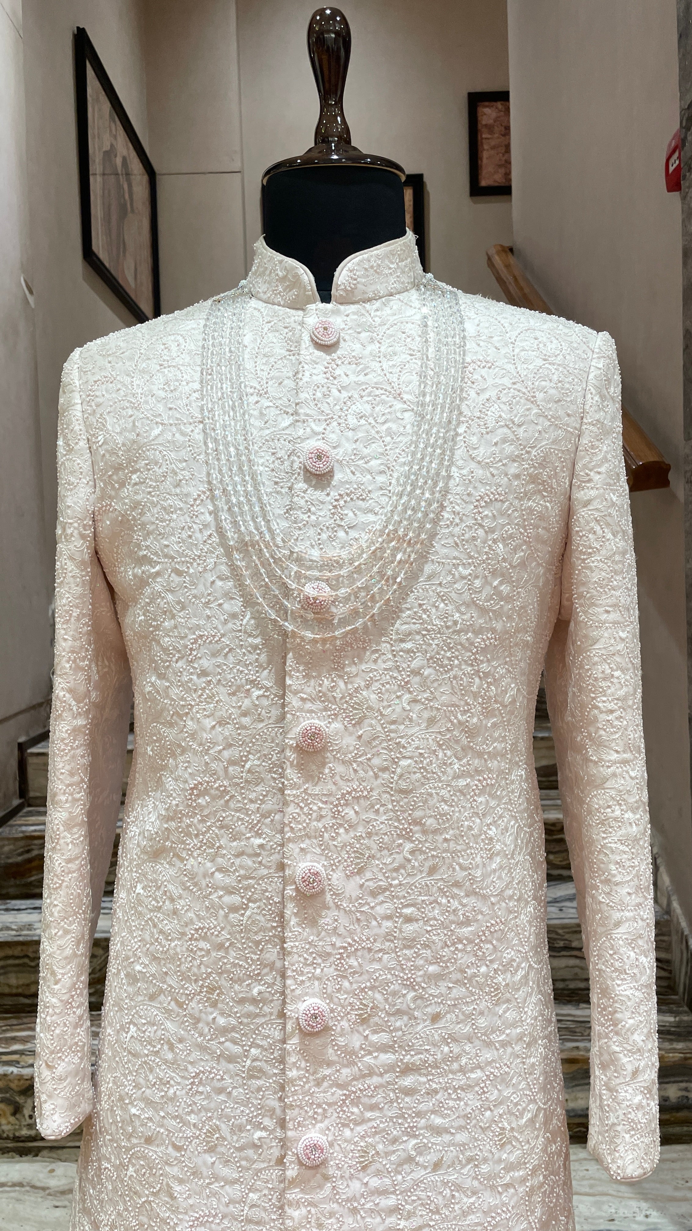 Ivory sherwani with pastel pink beadwork