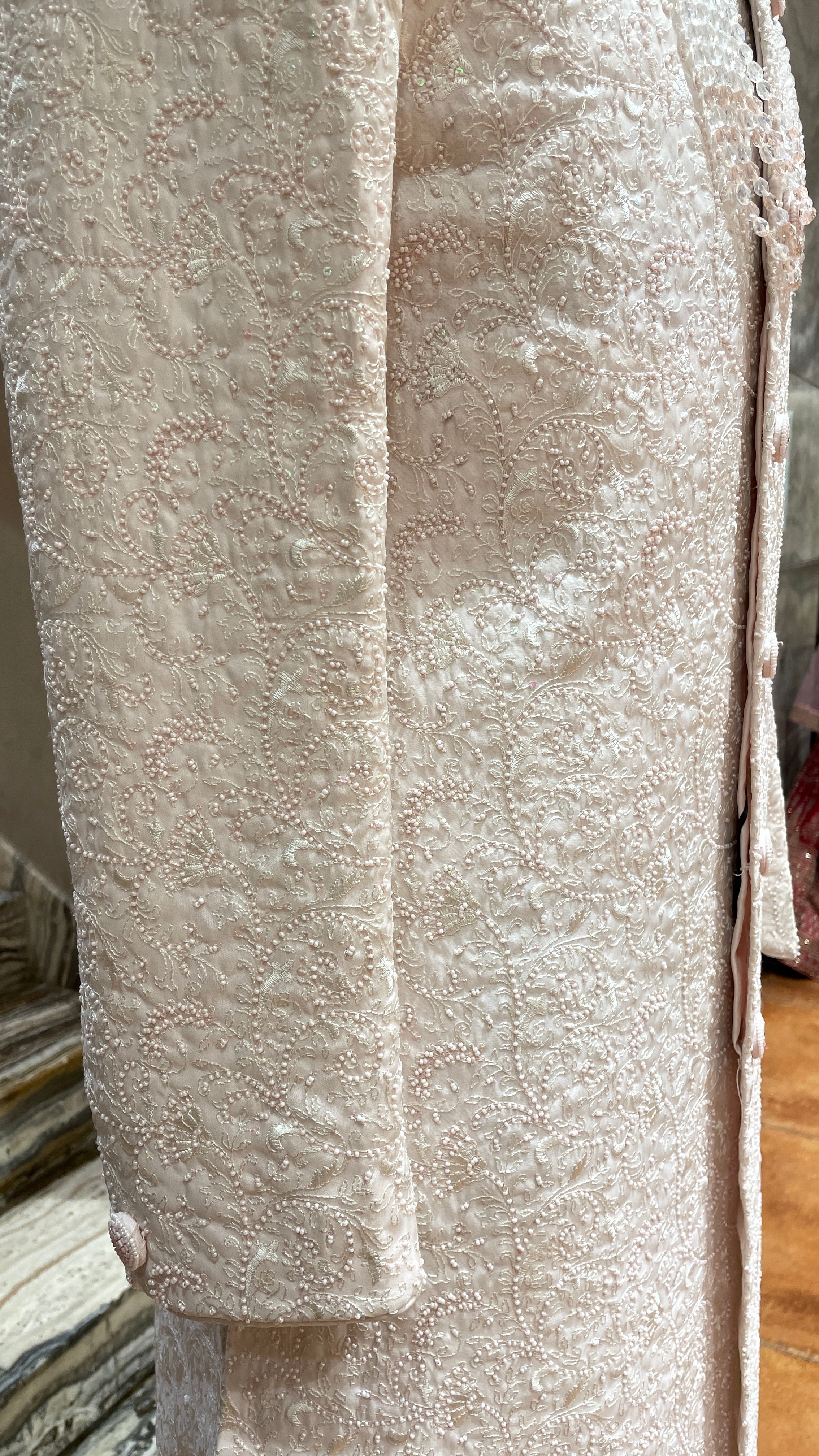 Ivory sherwani with pastel pink beadwork