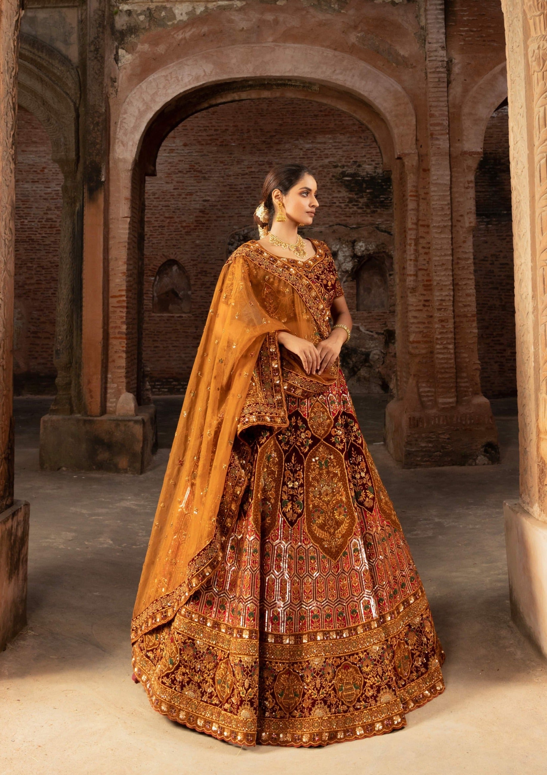 Lustrous Rusted Silk Bridal Lehenga with Sequins and Delicate Floral Motifs