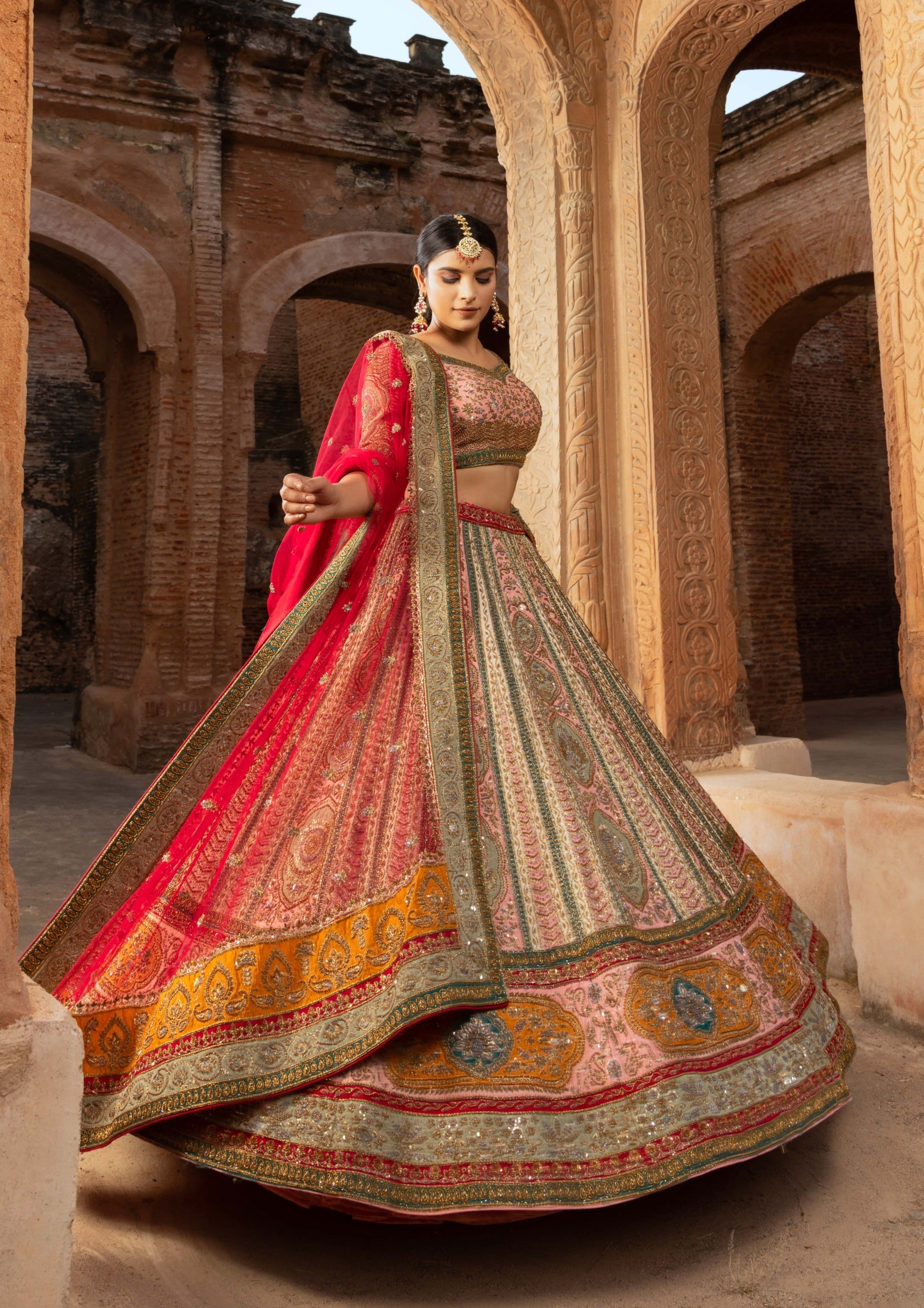Opulent Silk Bridal Lehenga with Hues and Heavy Zardozi Accents