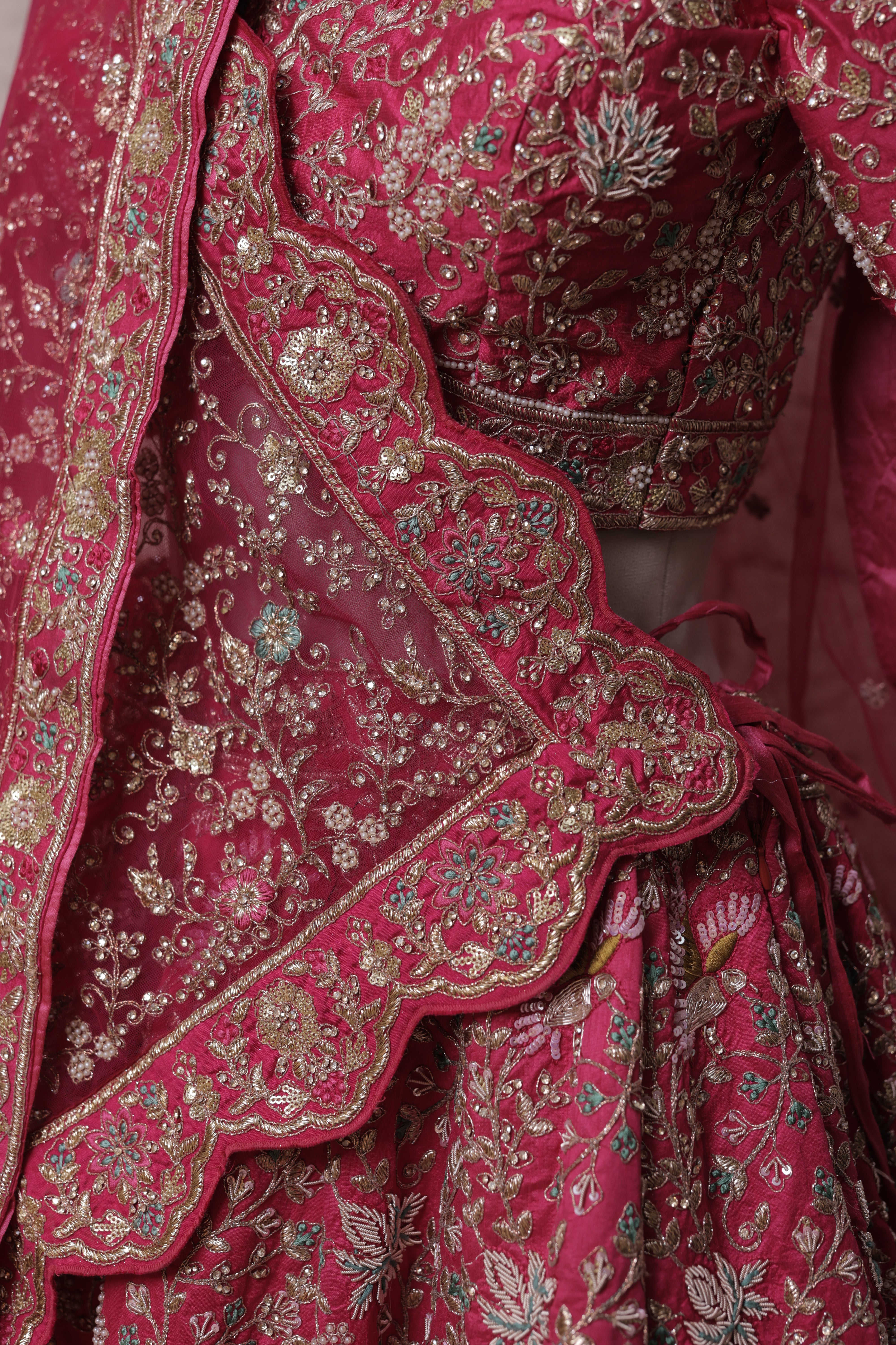 Rani bridal lehenga with flower & bird embroidery design