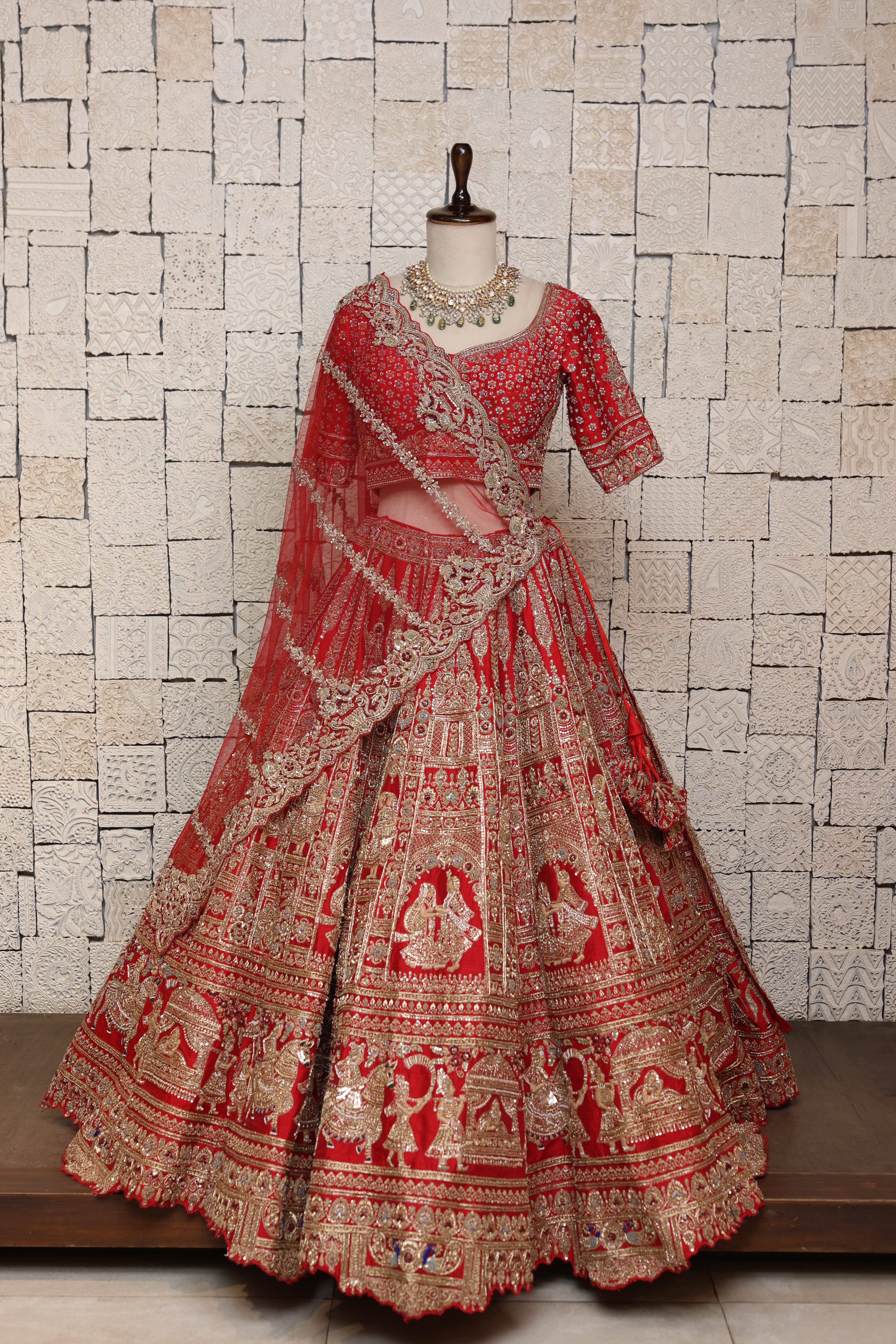 OPULENT RED SILK LEHENGA ADORNED WITH INTRICATE EMBROIDERY