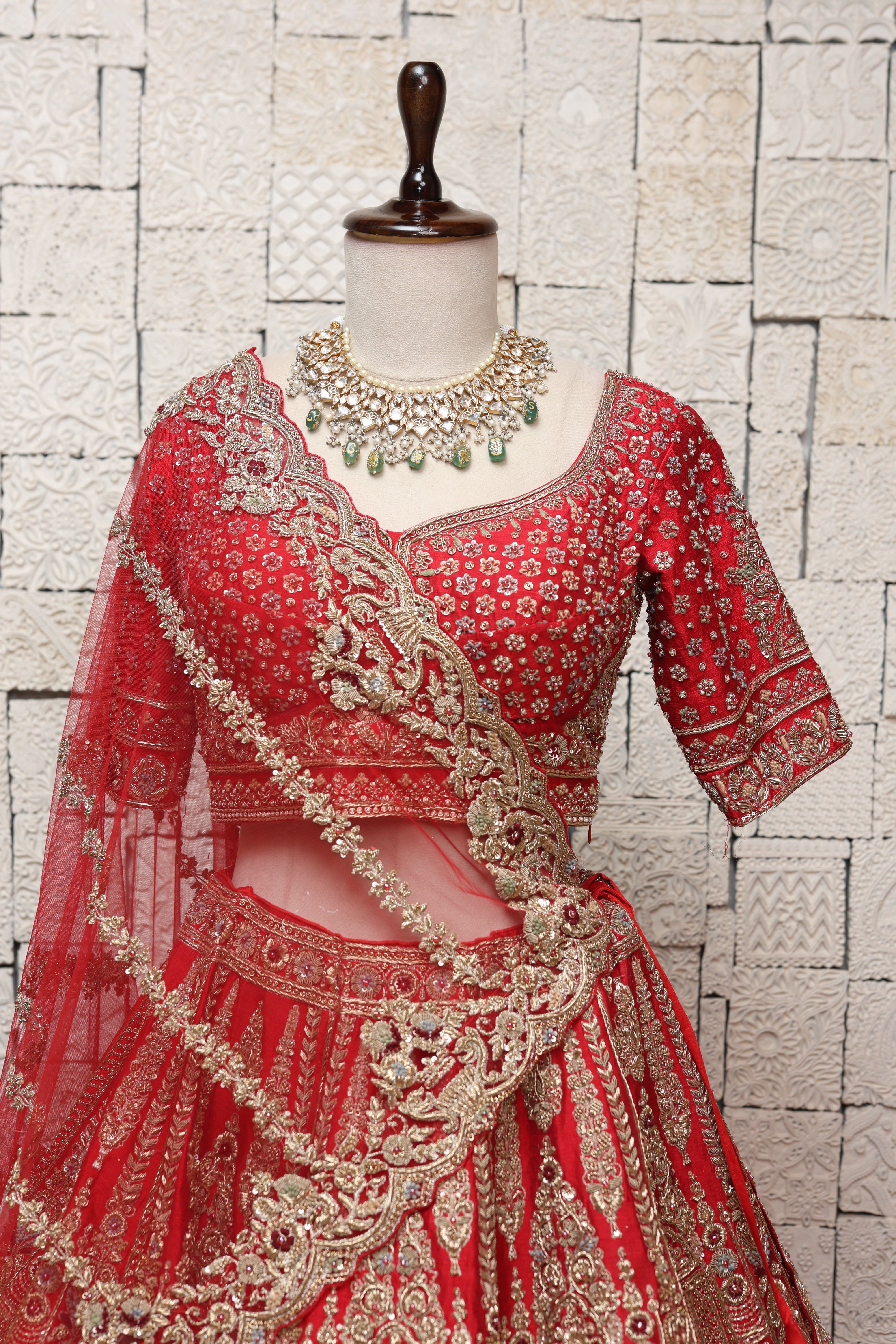 OPULENT RED SILK LEHENGA ADORNED WITH INTRICATE EMBROIDERY