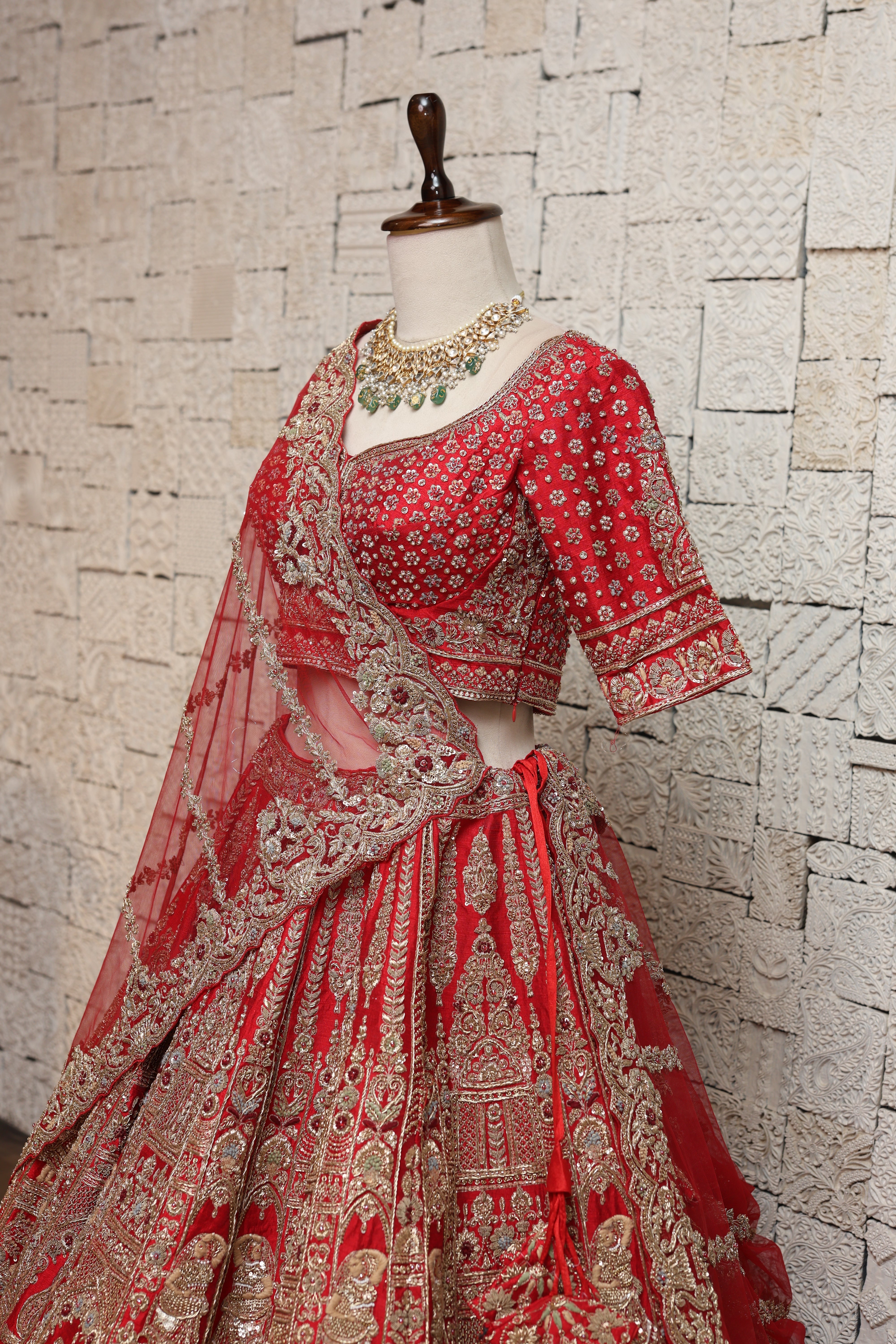 OPULENT RED SILK LEHENGA ADORNED WITH INTRICATE EMBROIDERY