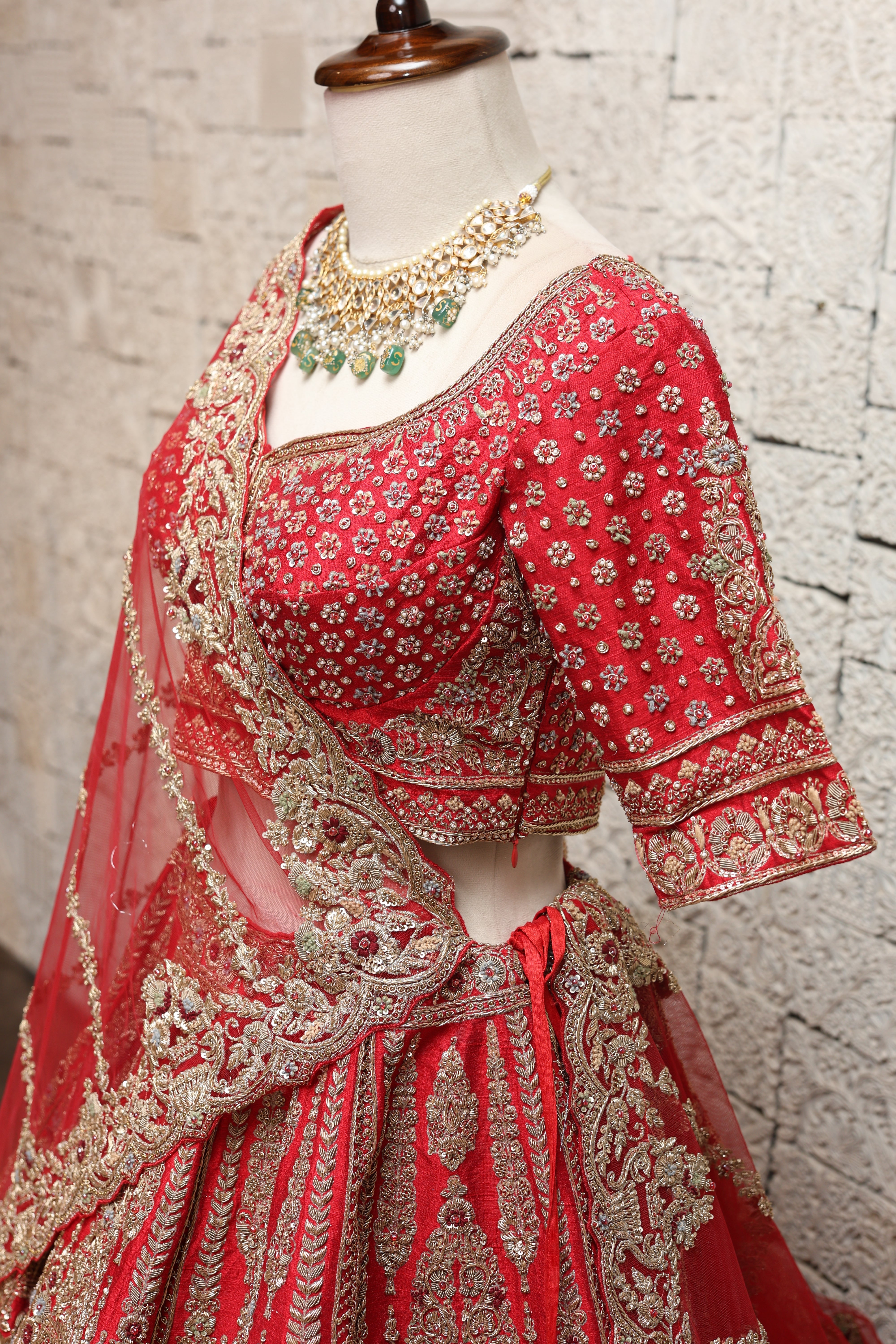 OPULENT RED SILK LEHENGA ADORNED WITH INTRICATE EMBROIDERY