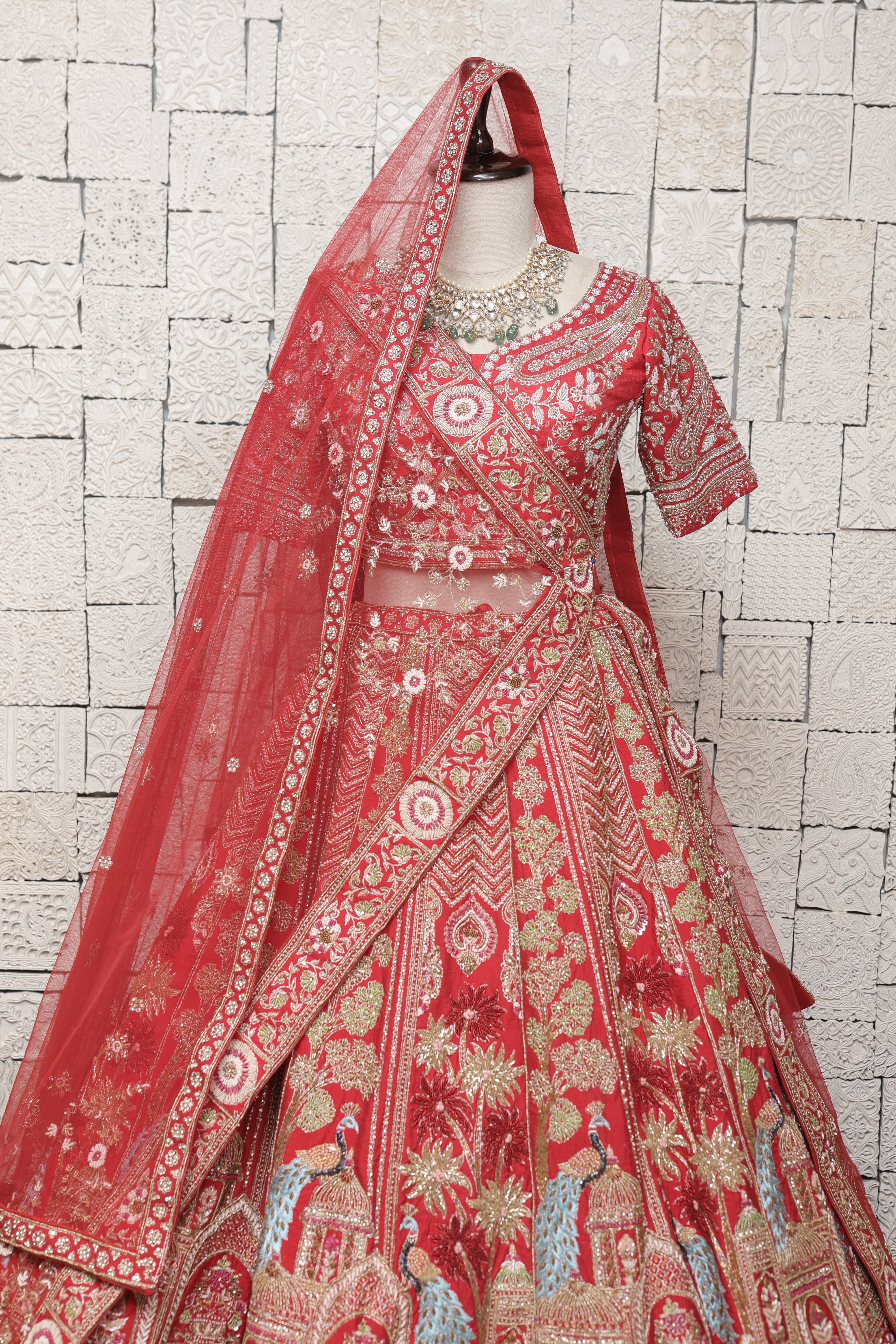RED BRIDAL LEHENGA WITH ROYAL PEACOCK MOTIFS & HEAVY ZARI EMBROIDERY