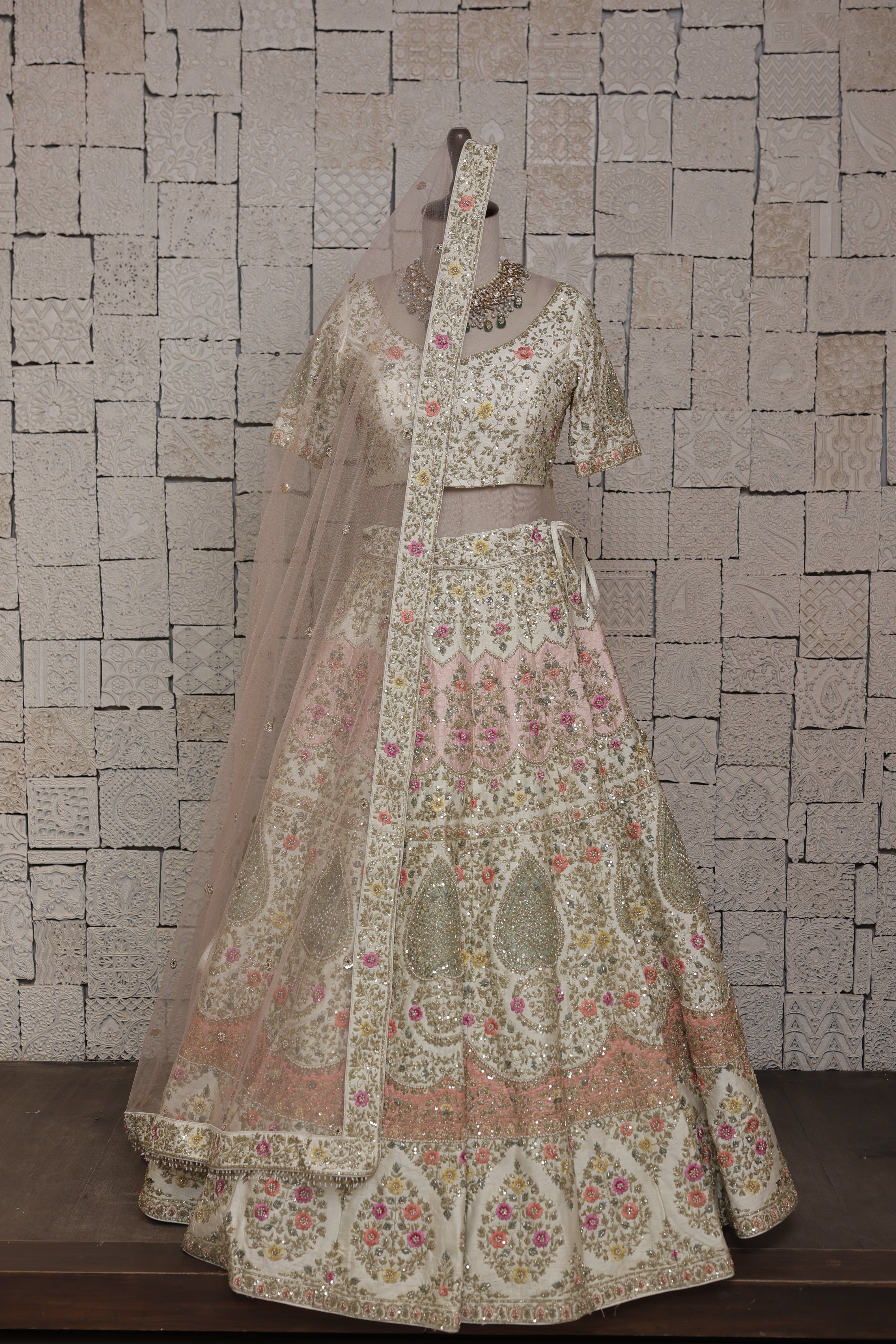 IVORY SILK LEHENGA WITH MULTICOLORED FLORAL EMBROIDERY