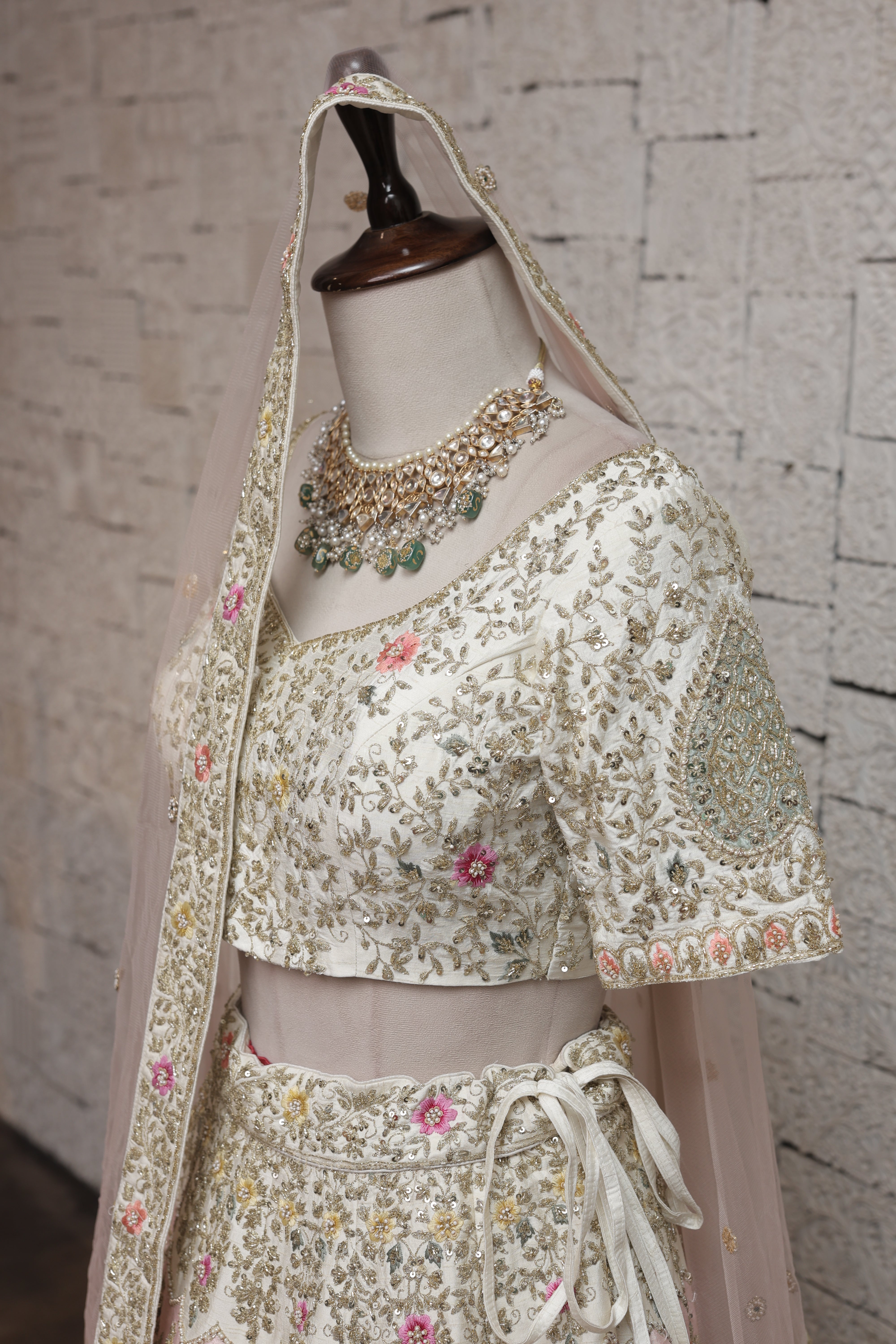 IVORY SILK LEHENGA WITH MULTICOLORED FLORAL EMBROIDERY