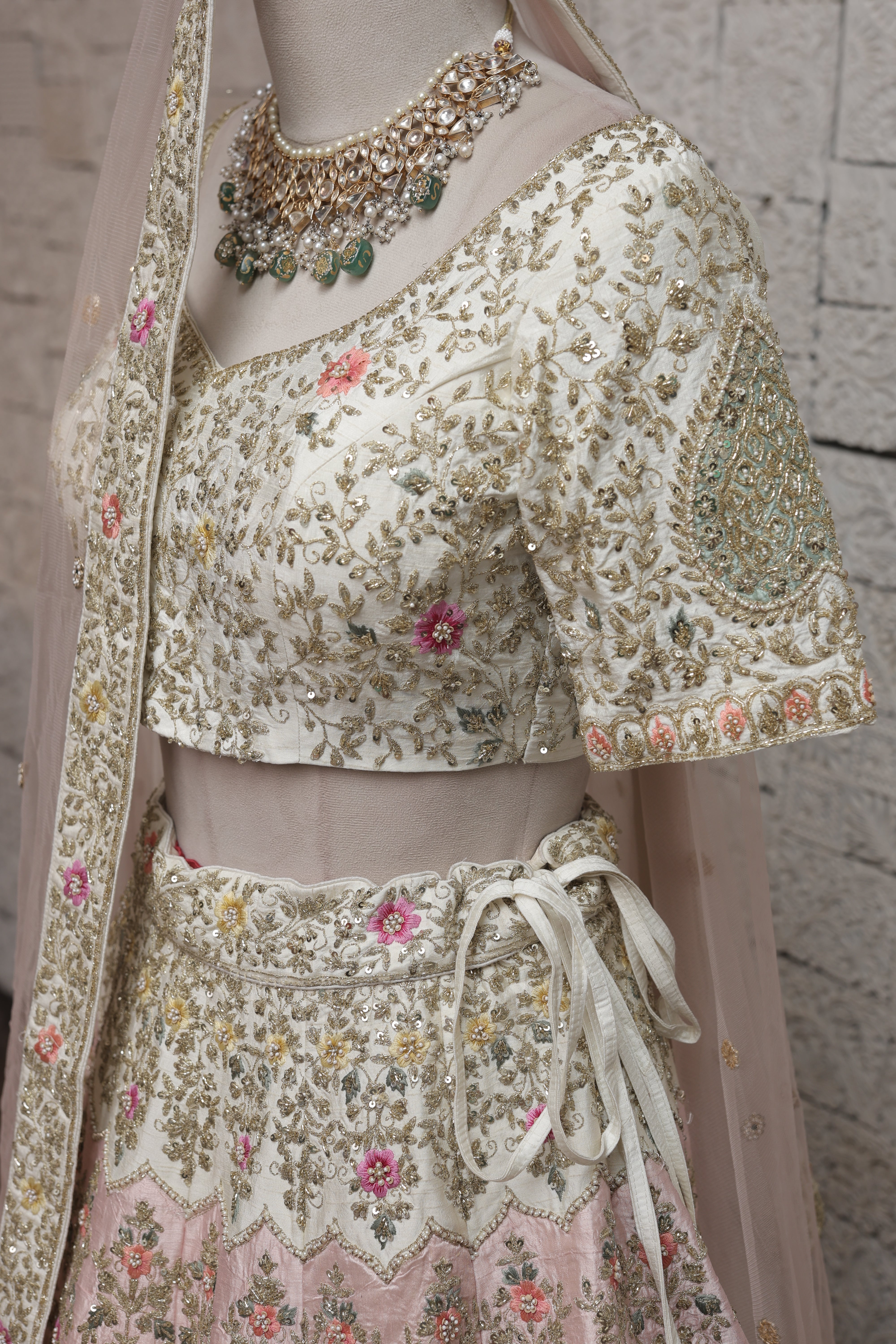 IVORY SILK LEHENGA WITH MULTICOLORED FLORAL EMBROIDERY