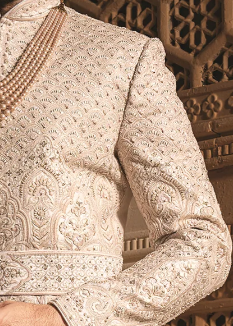 Gold Silk sherwani with heavy embroidery