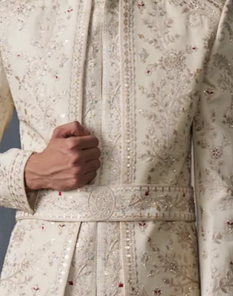 Cream silk sherwani with embellishments