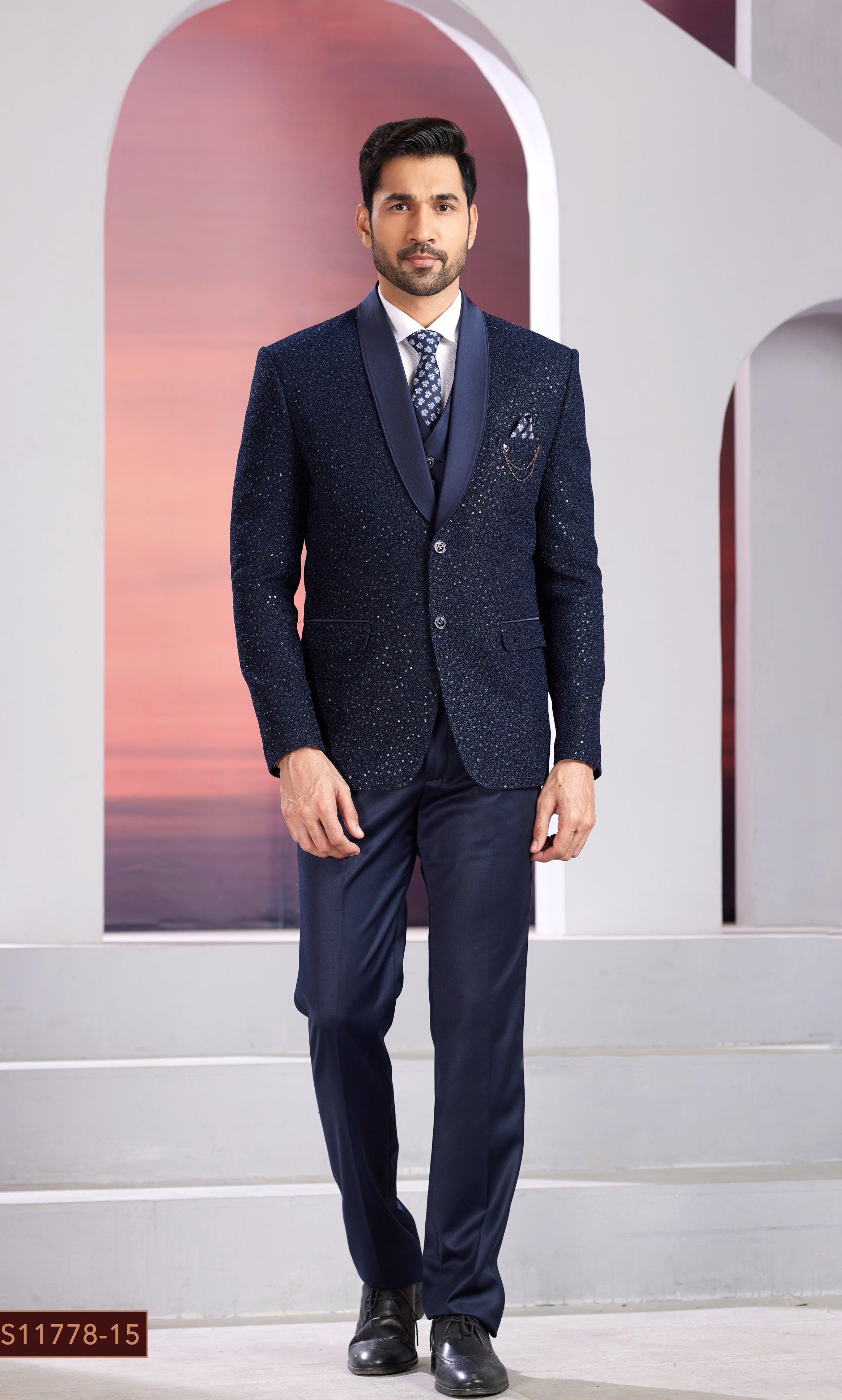 Blue men’s tuxedo with embellishments