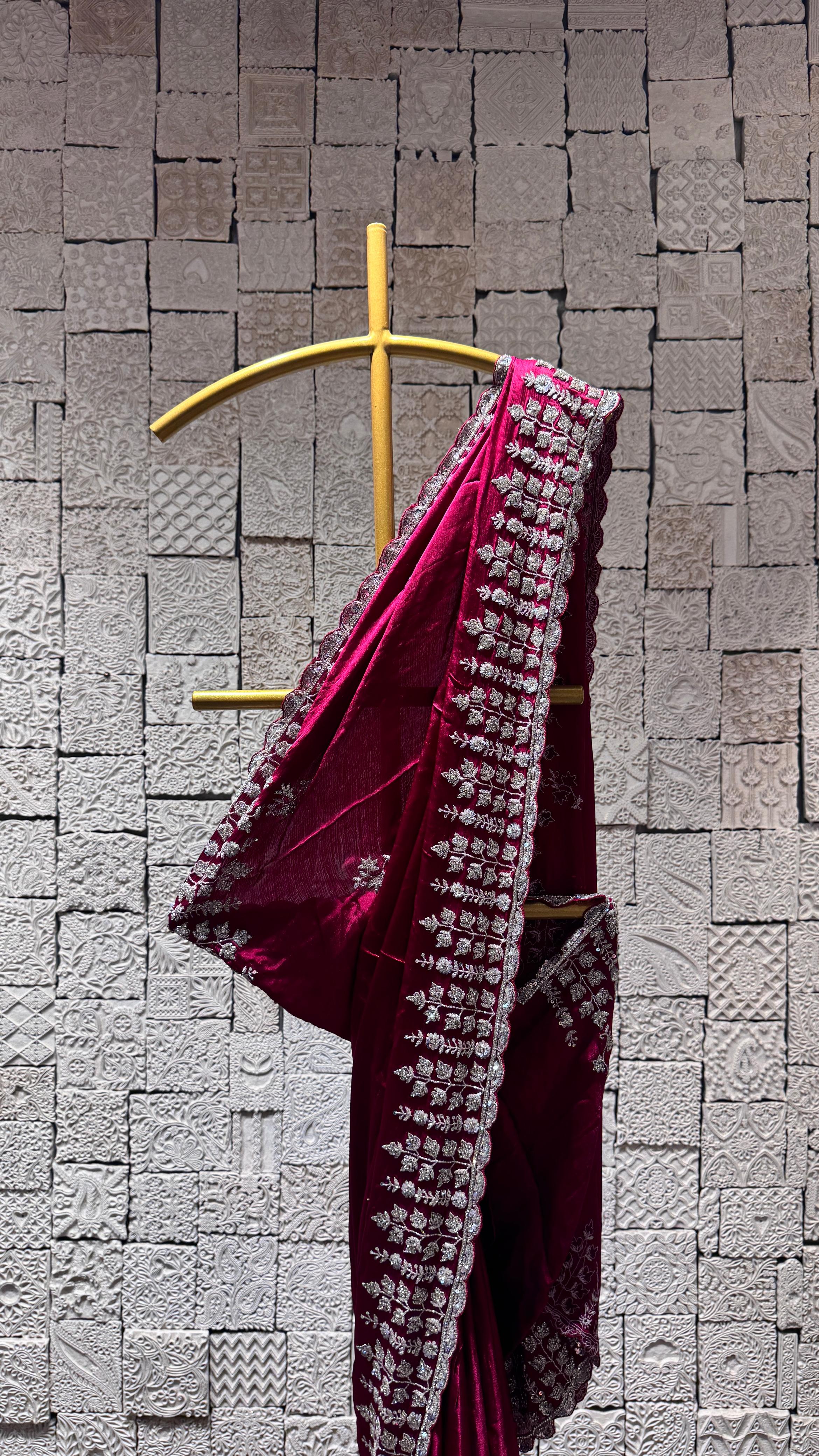 Deep pink saree with heavy floral border