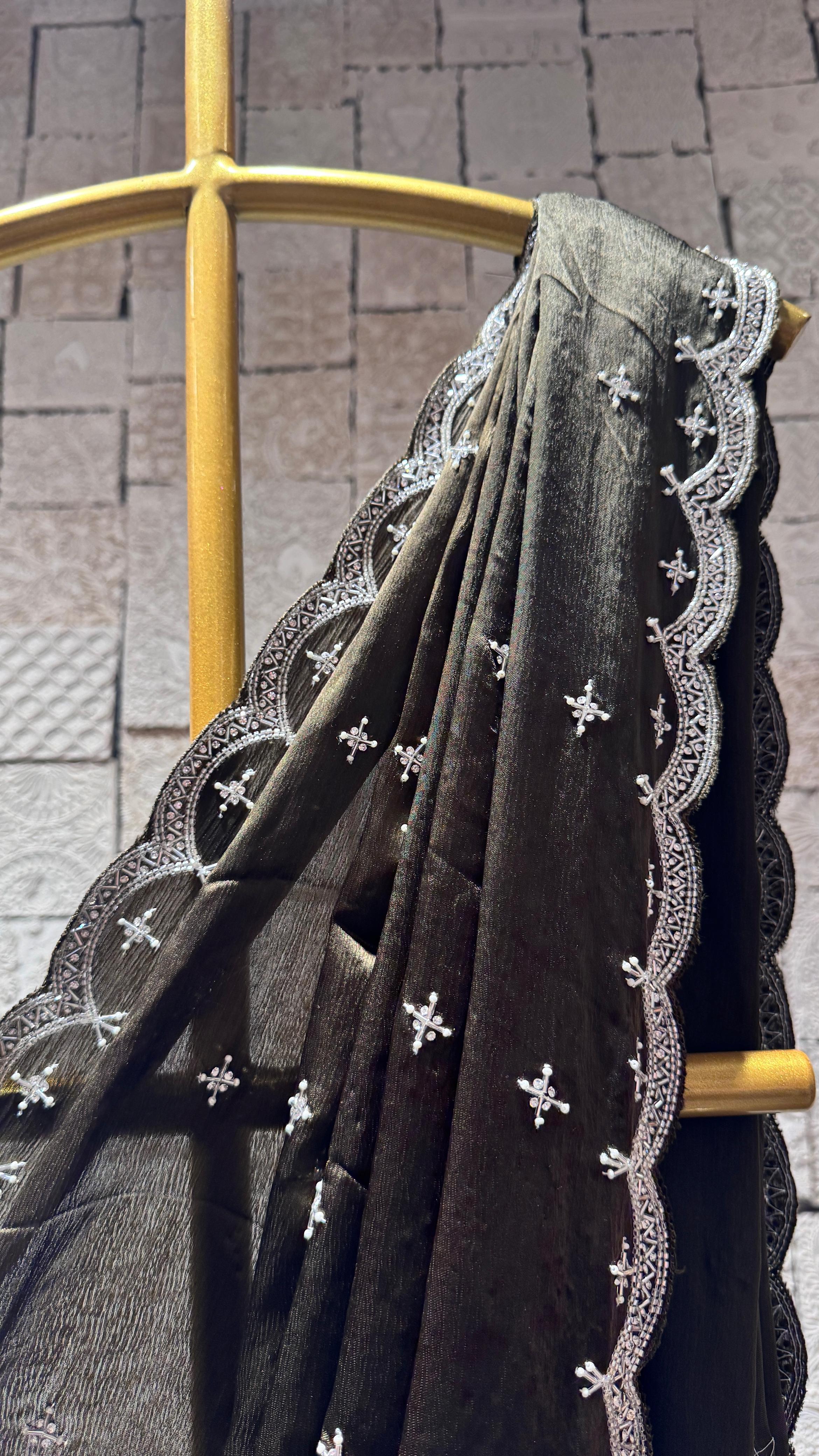 Green saree with heavy border