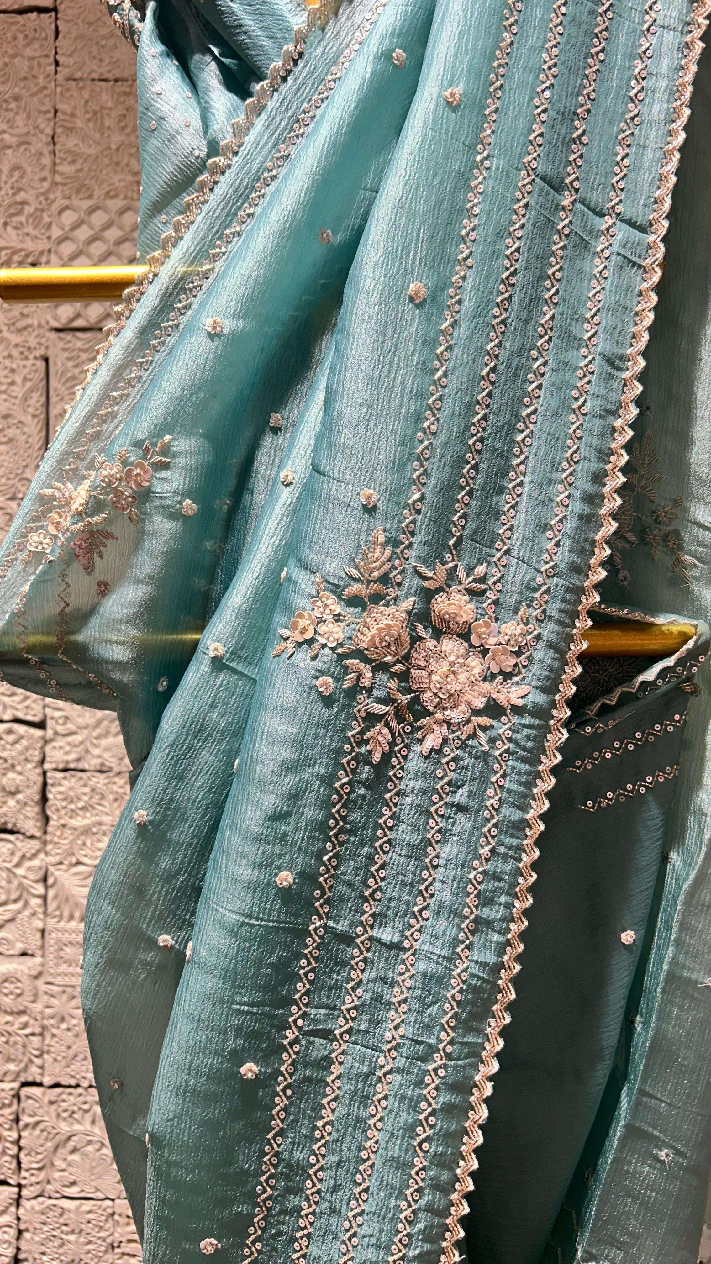 Light blue saree with zig-zag border