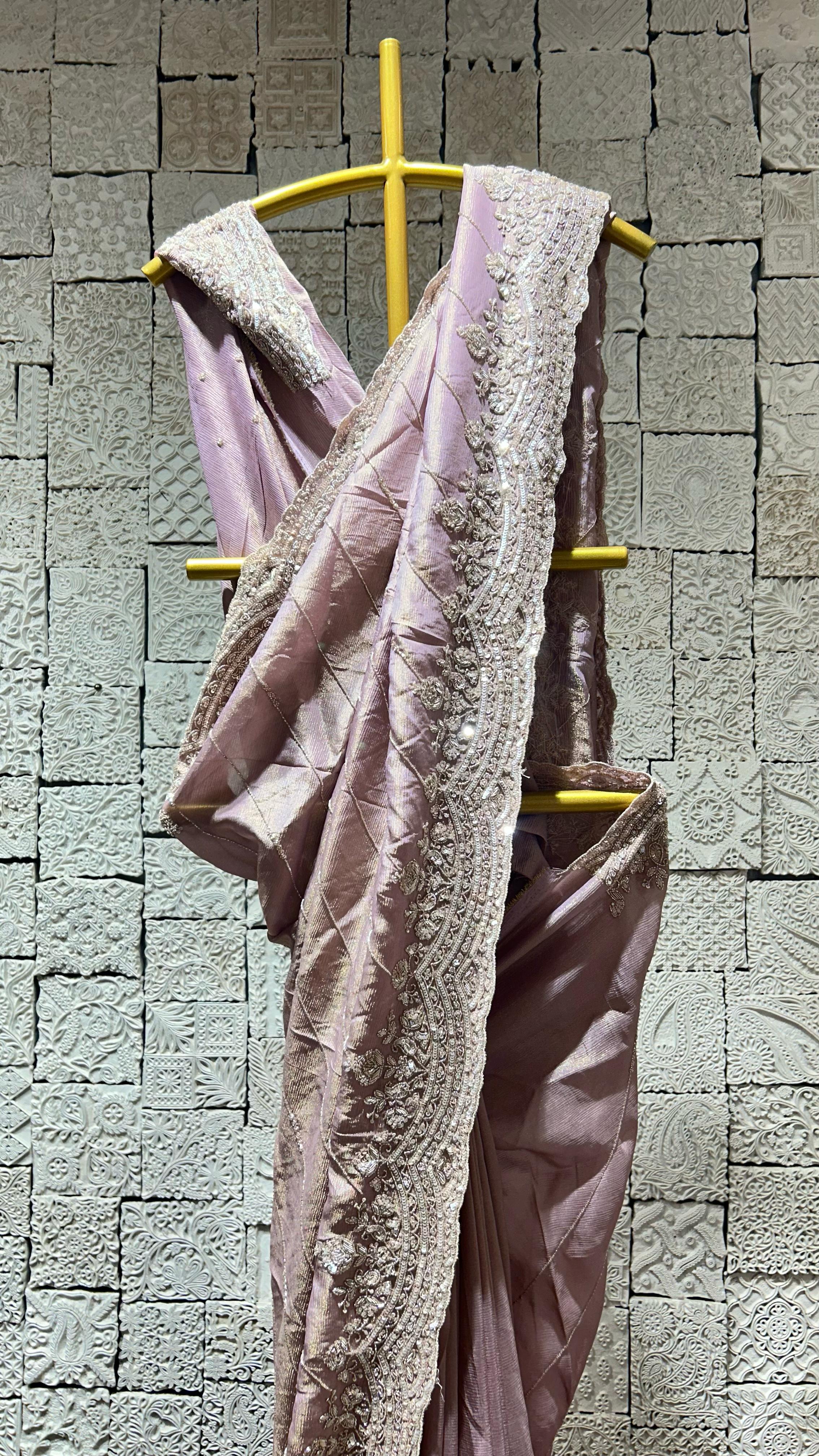 Onion color saree with heavy floral border