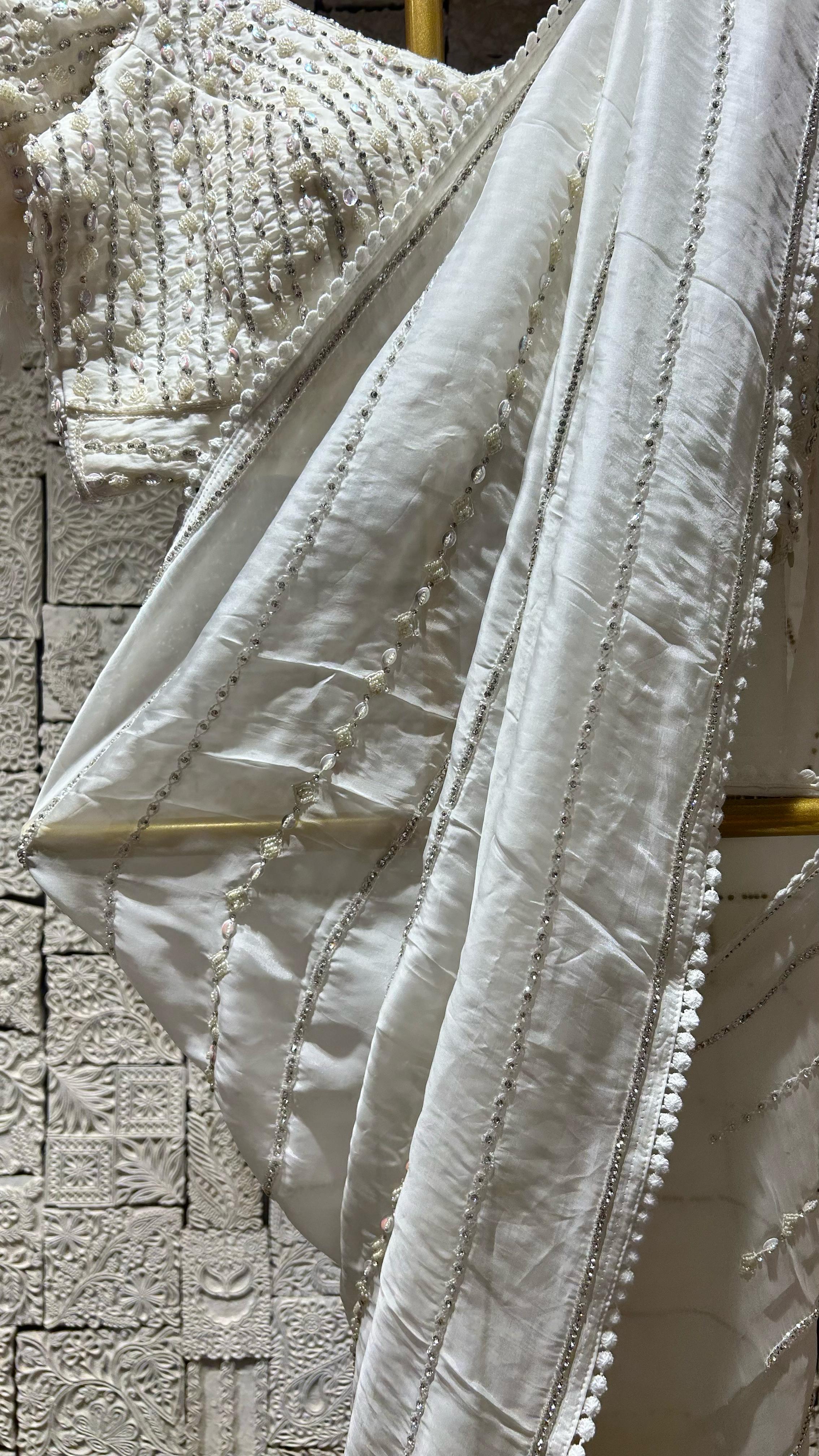 White saree with simple delicate border