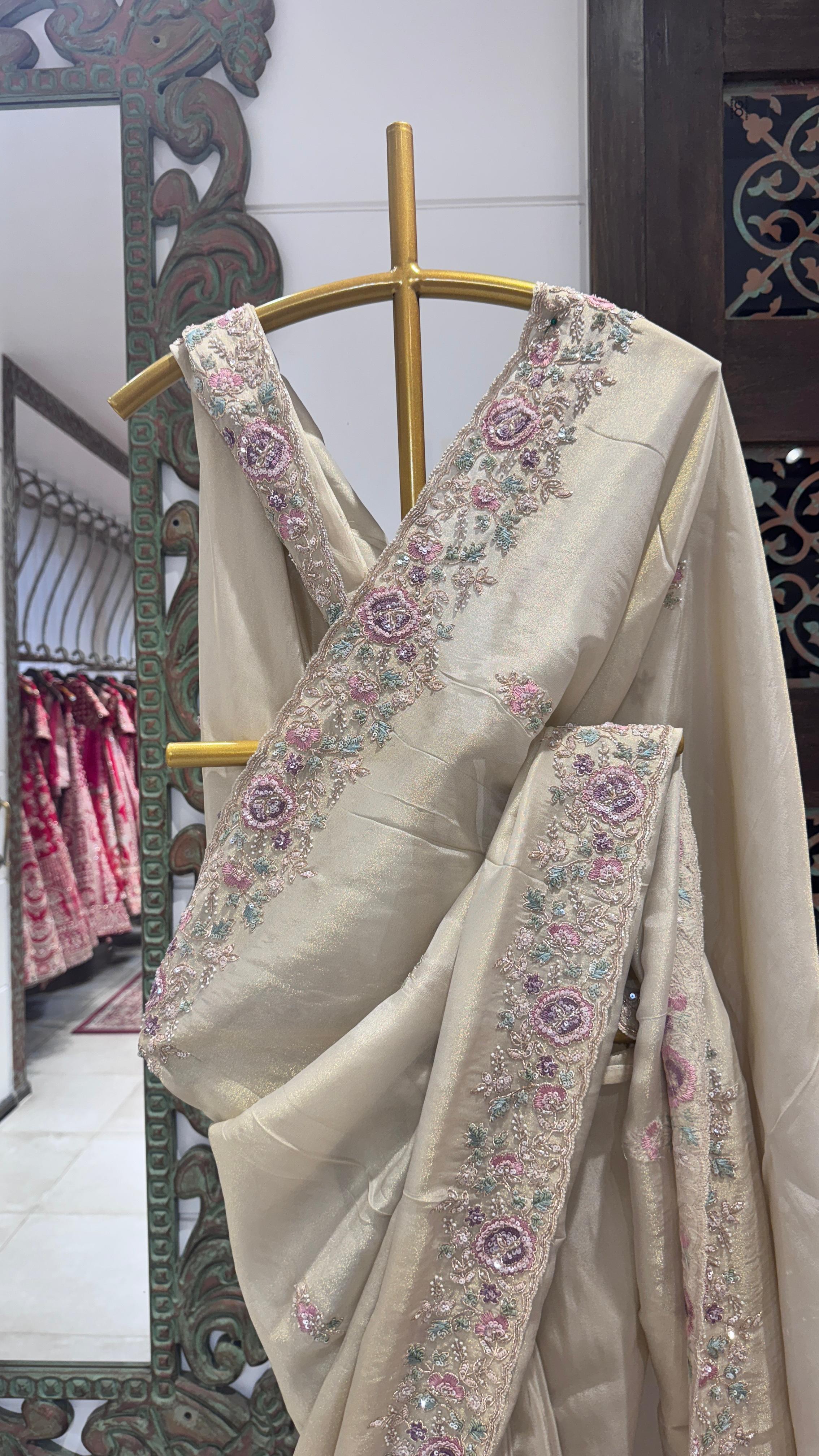 Ivory color saree with floral border