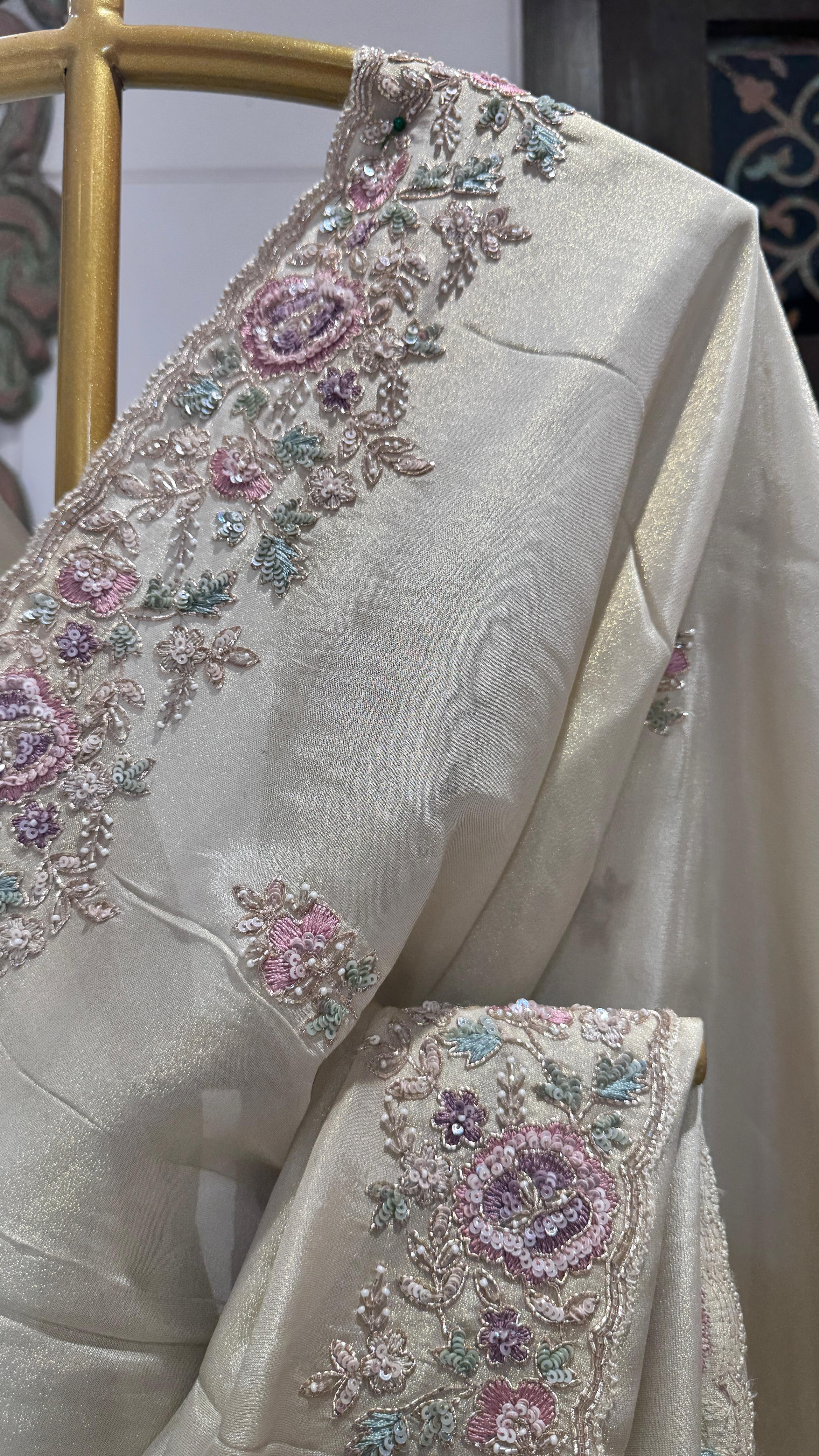 Ivory color saree with floral border