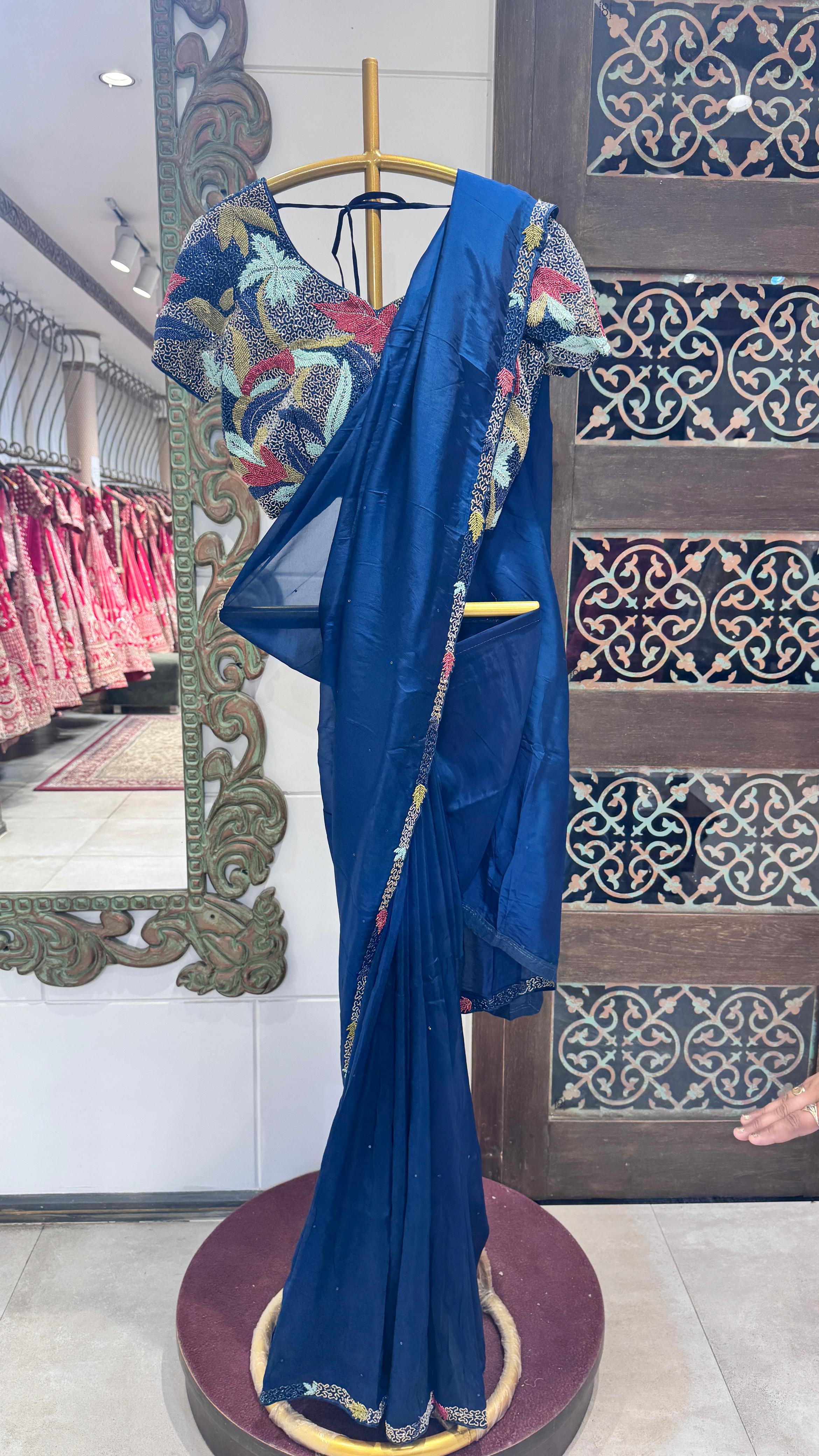 Teel blue color saree with sequience border