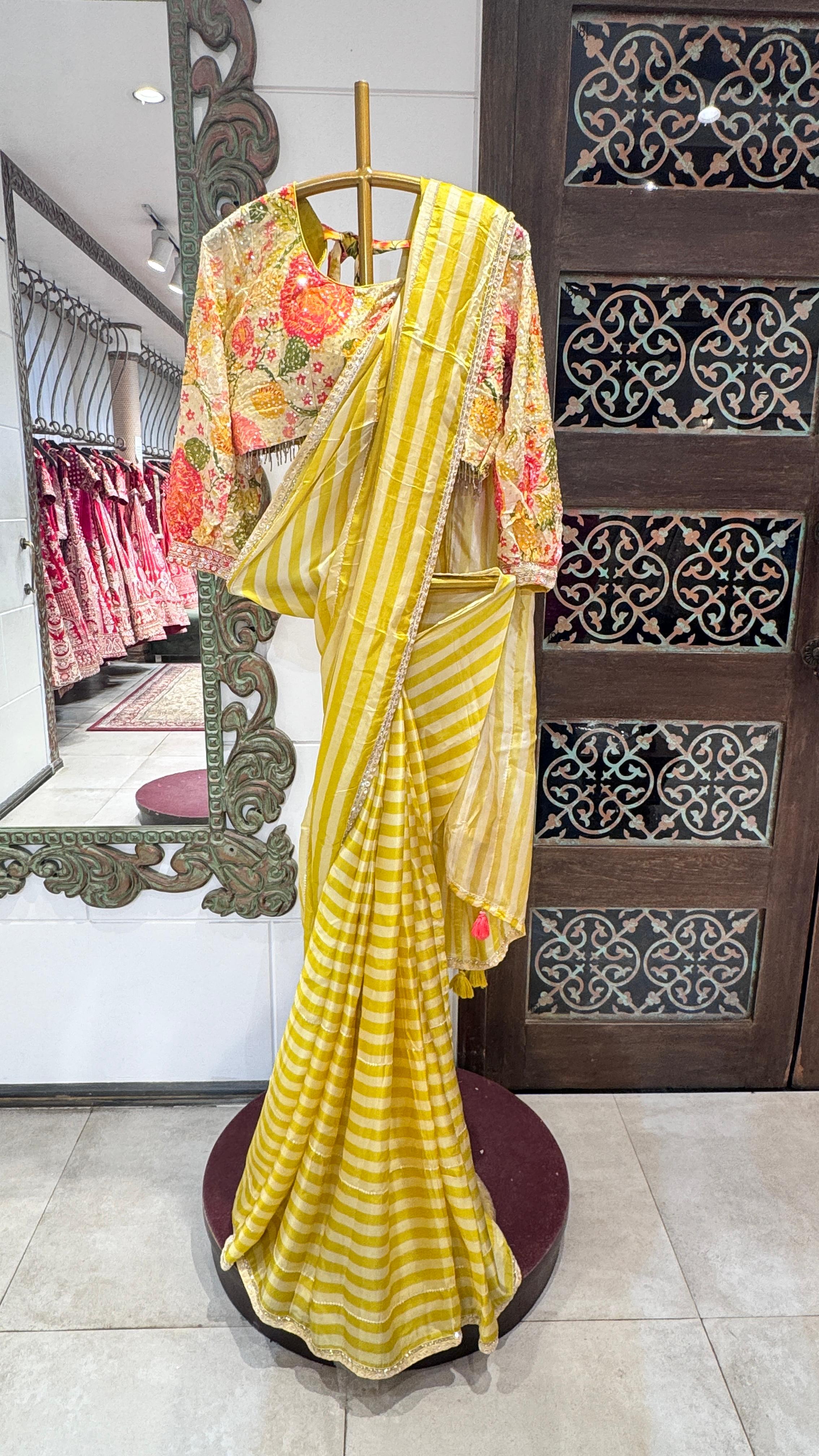 Light green saree with simple sophisticated floral border