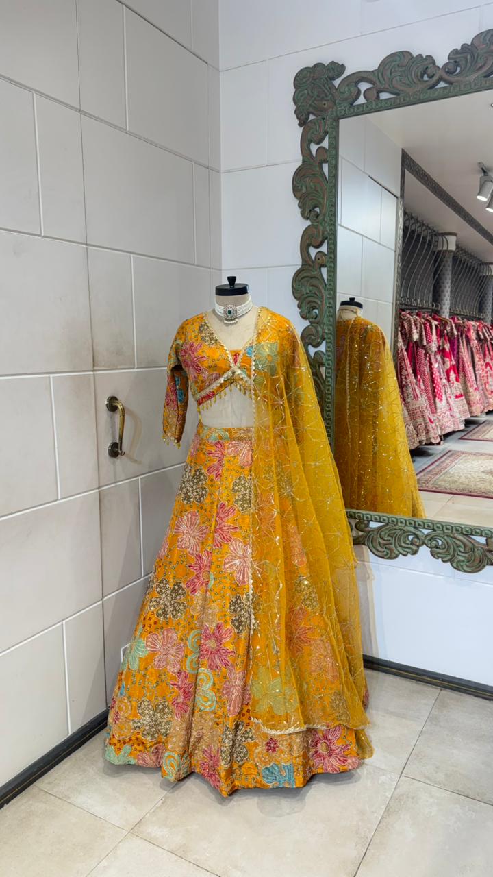 Yellow multi colour lehenga
