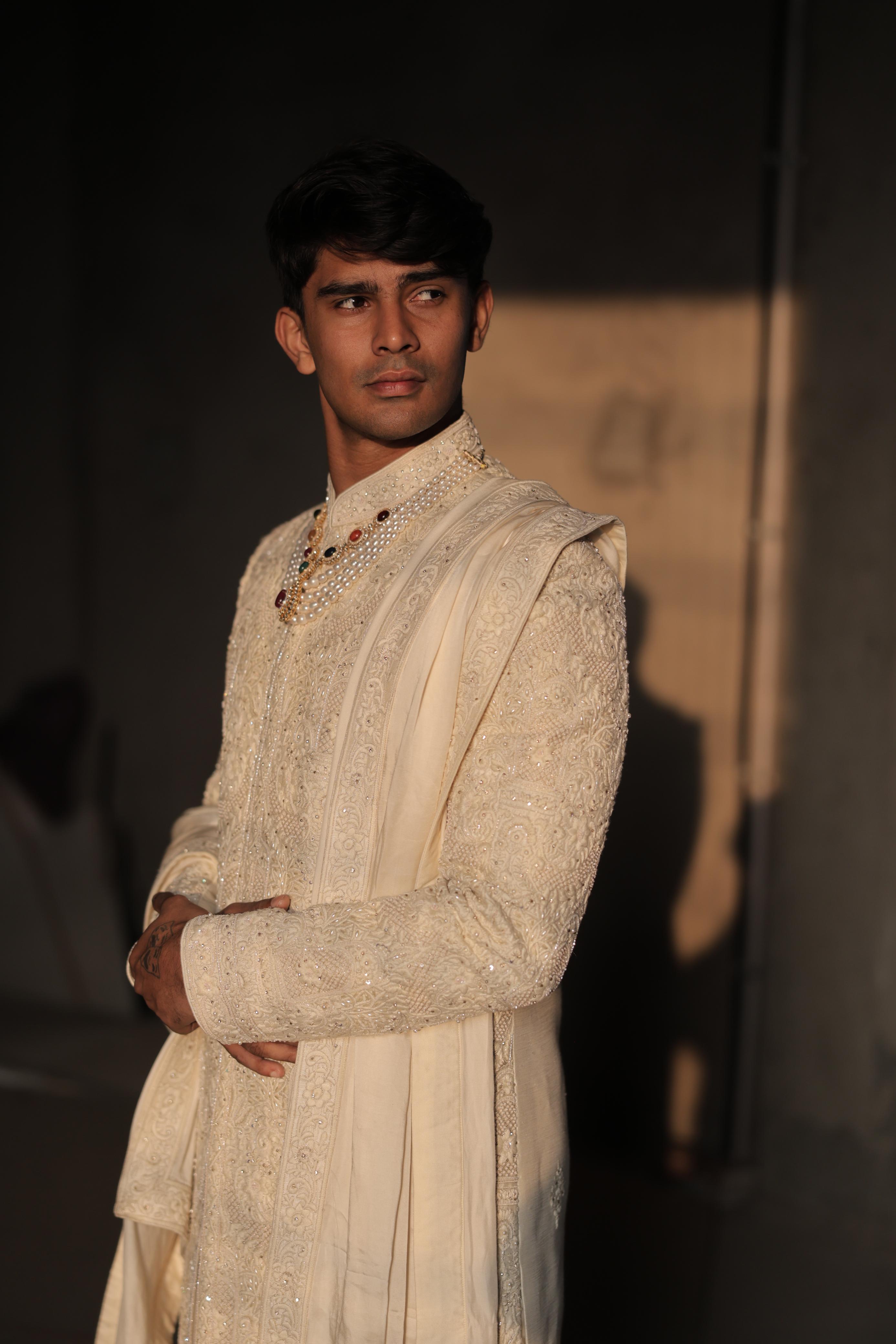 Ivory silk sherwani with intricate embroidery