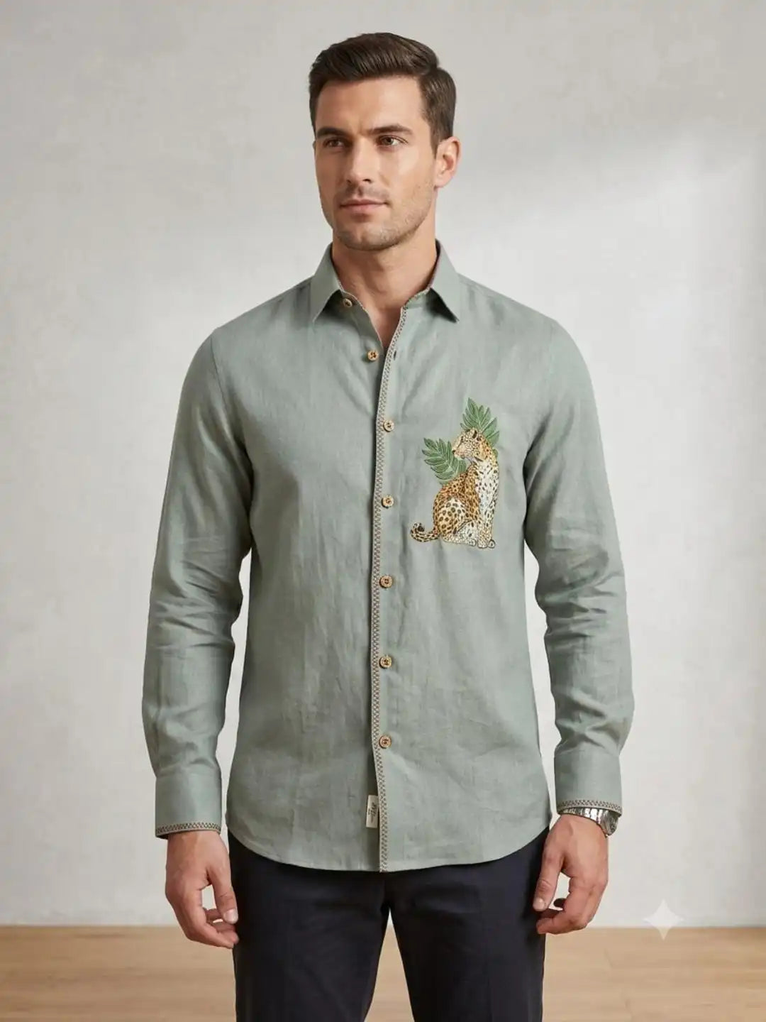 Sage green linen hand-painted shirt with signature leopard & tropical leaf artwork on chest