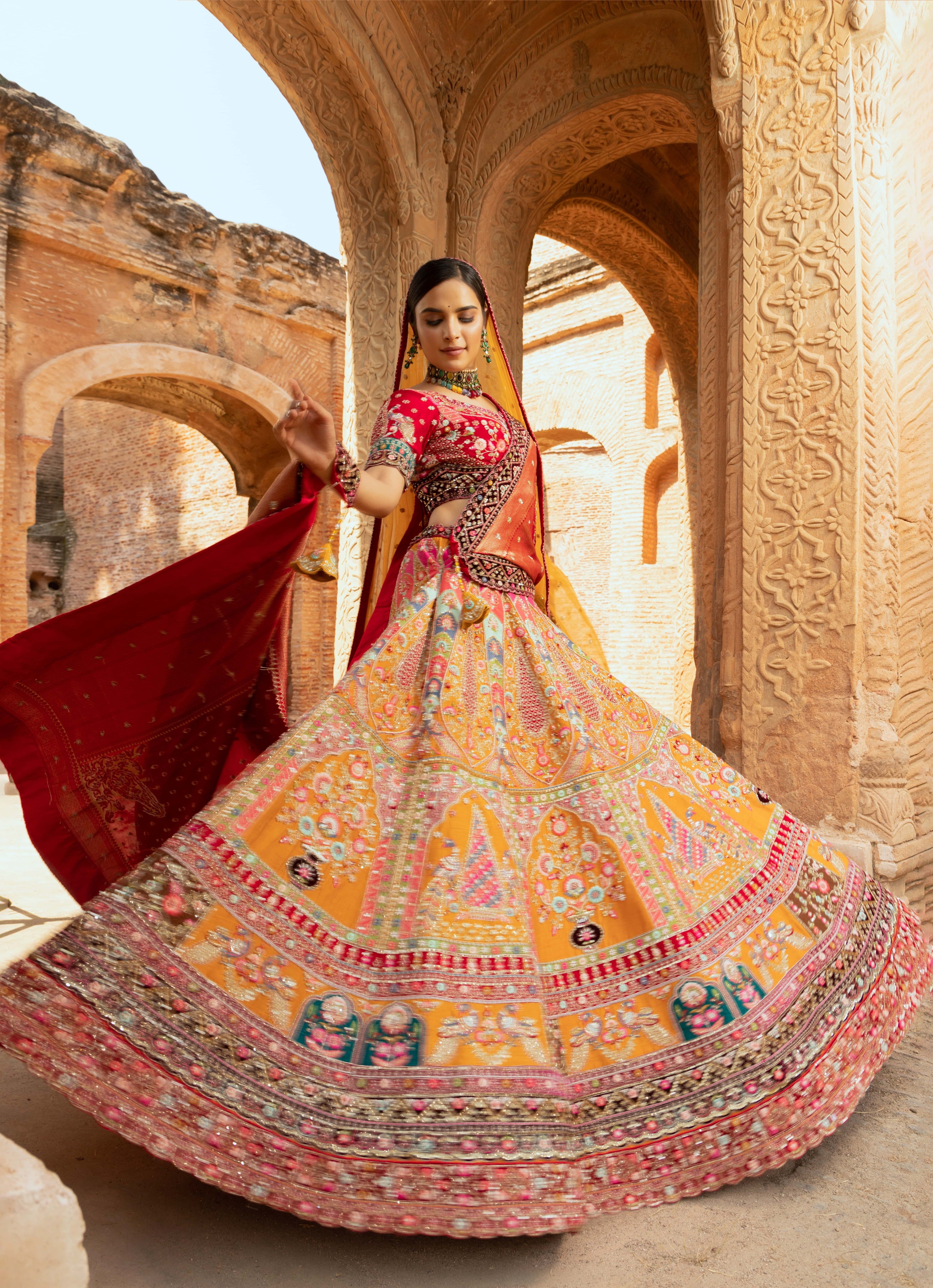Yellow multi coloured zardozi bridal lehanga