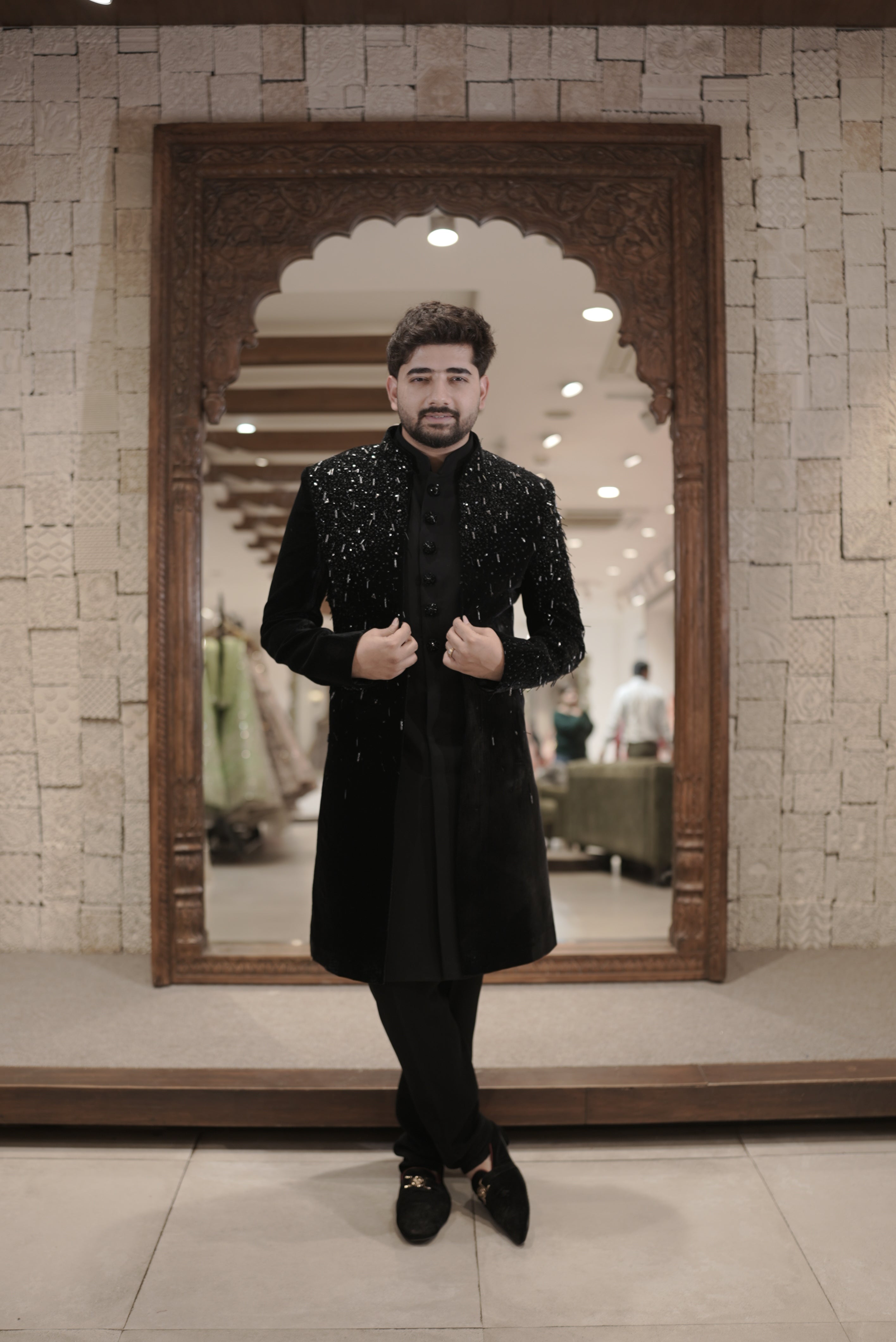 Black velvet indo-western sherwani with sequin embellishments
