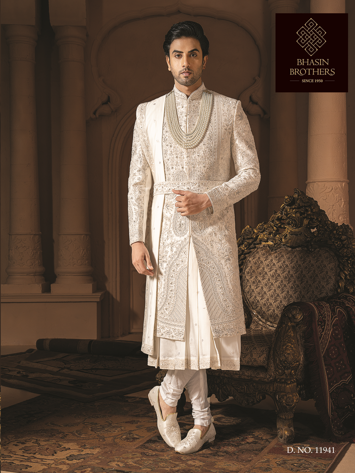 Ivory silk sherwani with silver heavy embroidery and waist belt (accessories included)
