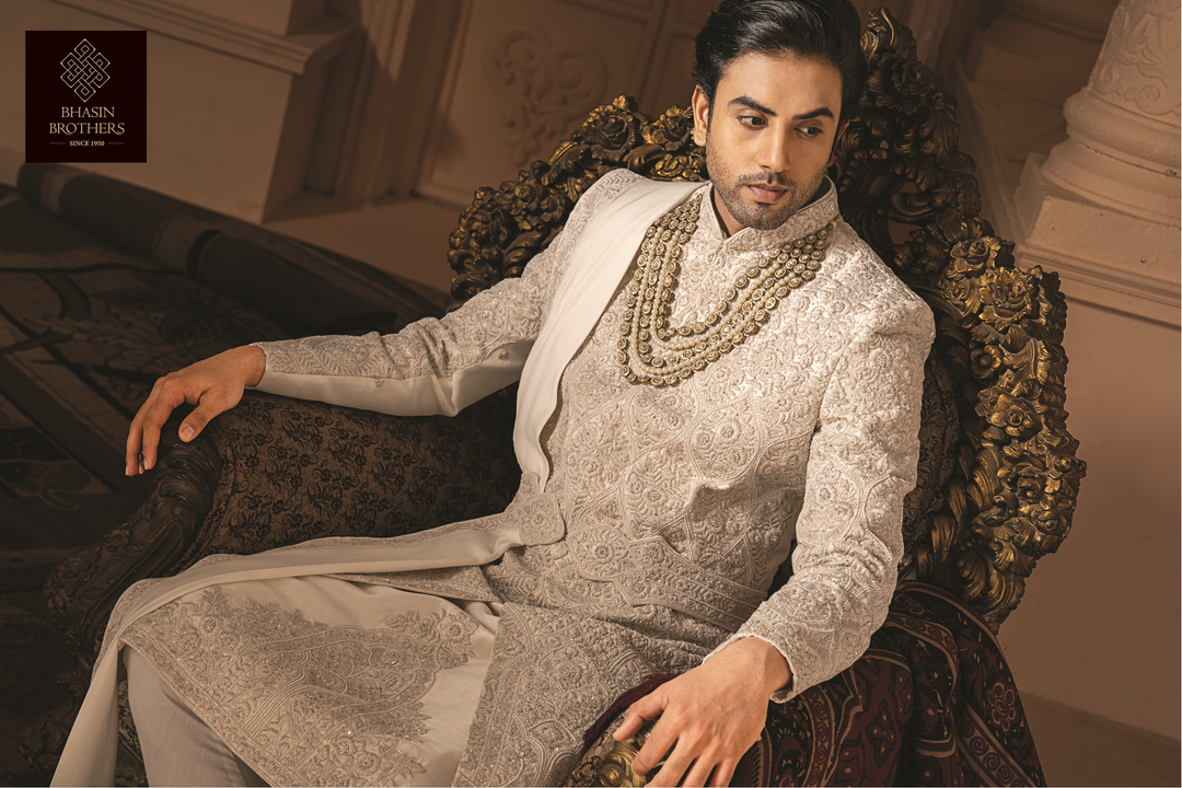 Ivory silk sherwani with golden embroidery
