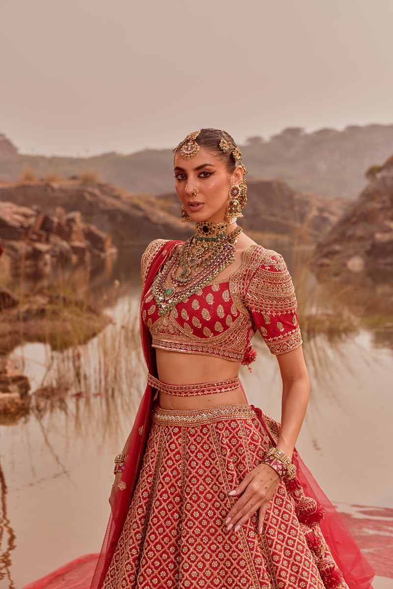 Red heavy Butti embellished bridal lehenga