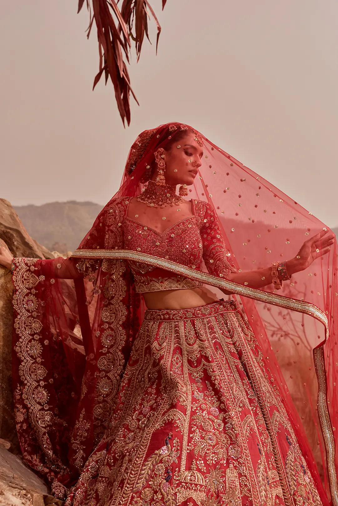 Red silk lehenga with zardozi work