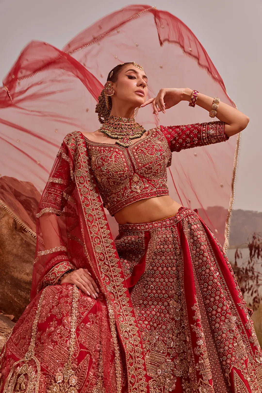 Classic red bridal lehenga with all over zari and thread work