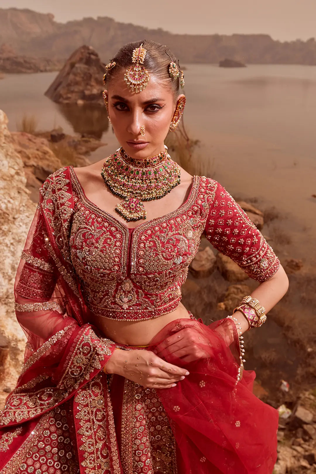 Classic red bridal lehenga with all over zari and thread work