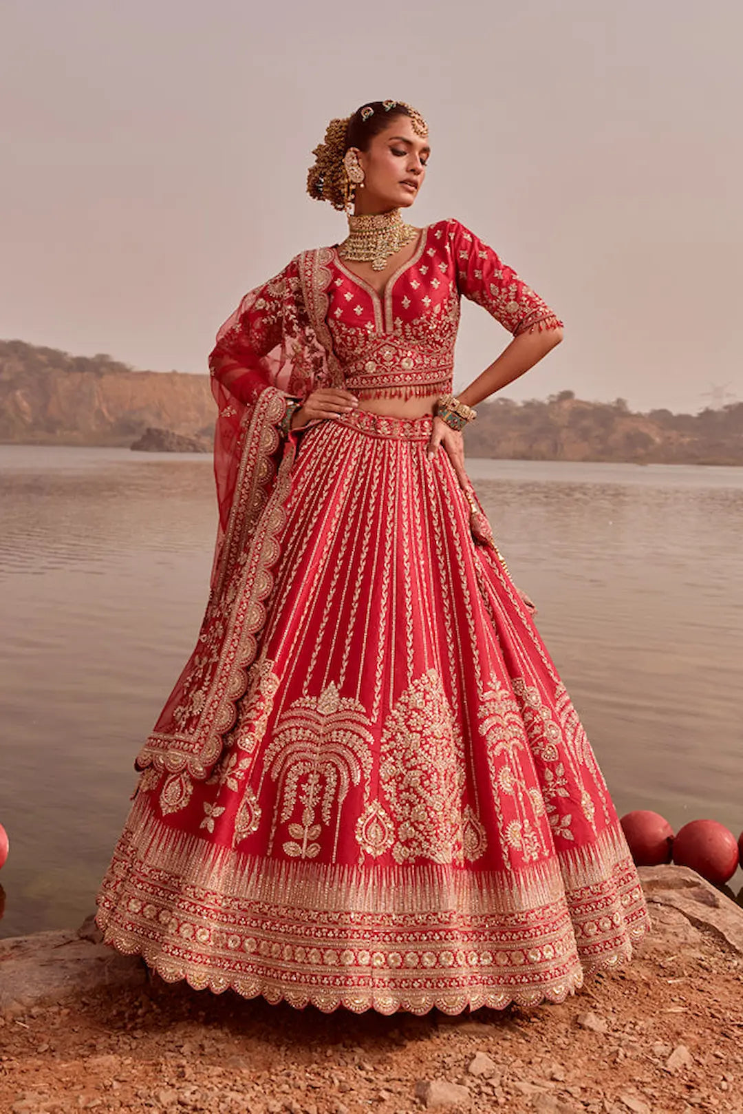 Red bridal lehenga with heavy zari and cutdana embroidery and dual dupatta