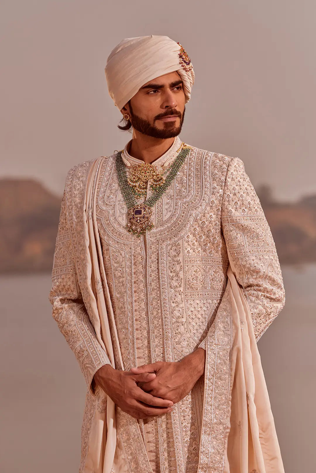 Rose gold silk Sherwani set in thread work embroidery