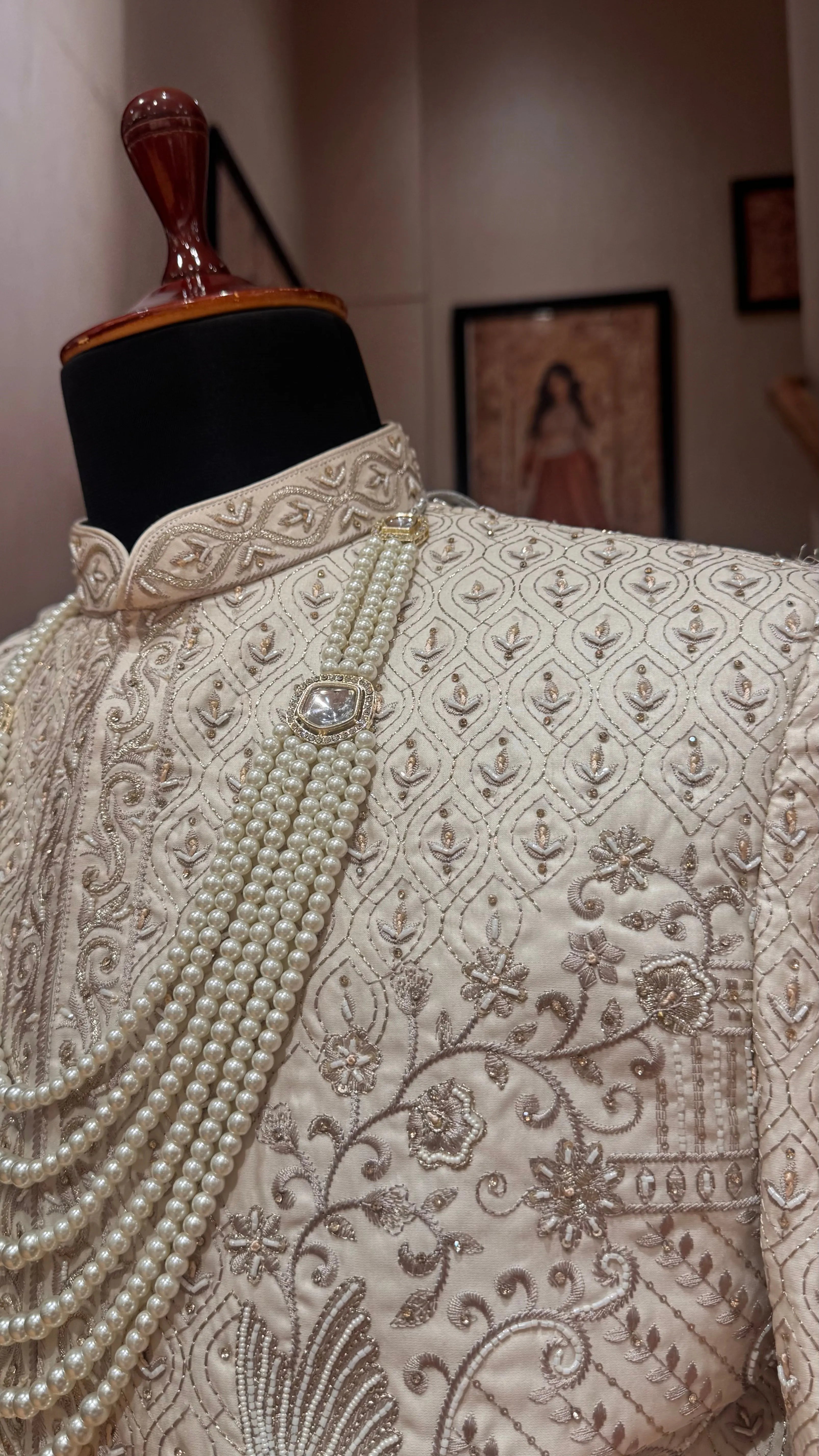 Off white silk Sherwani with intricate embroidery