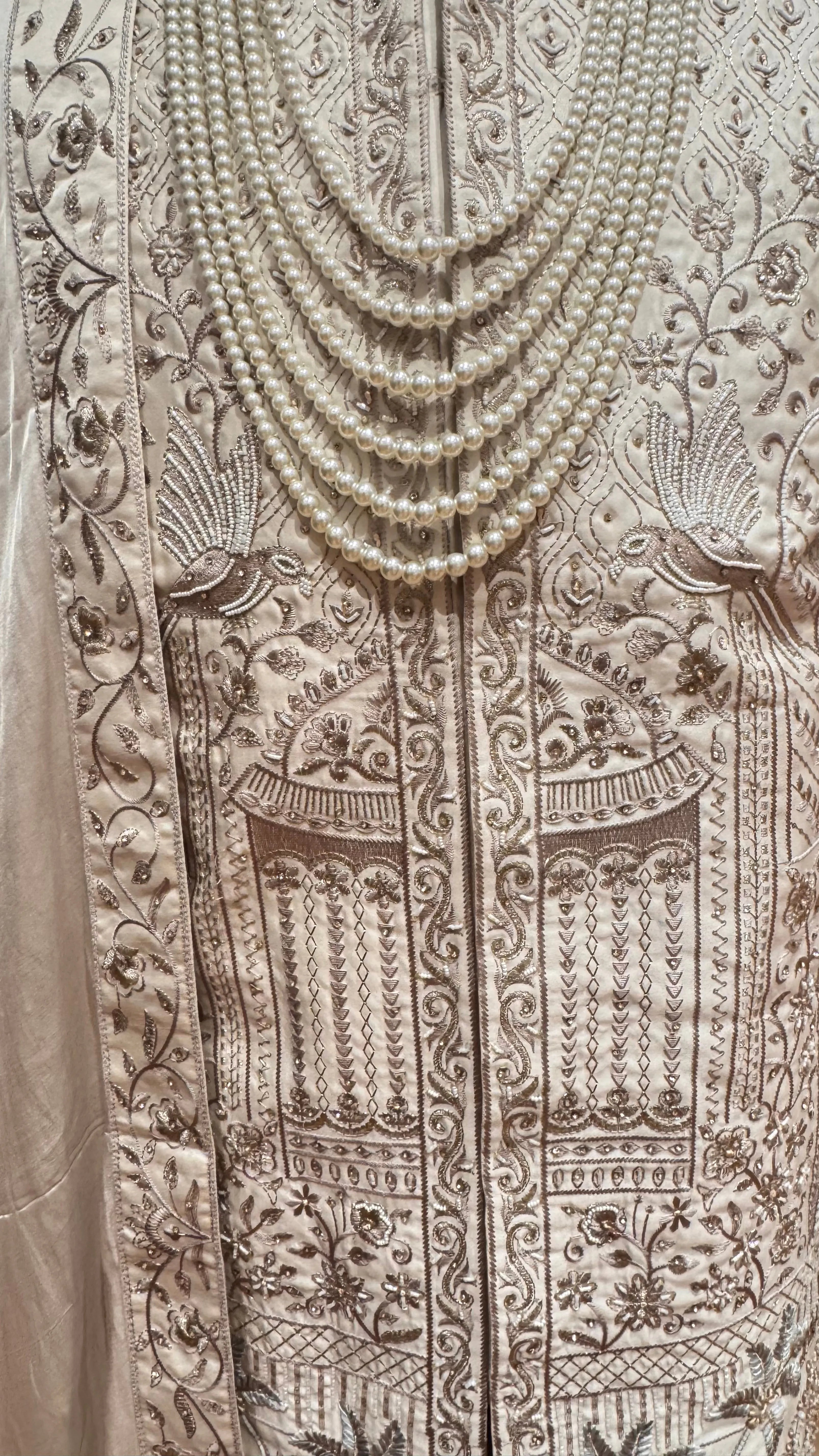 Off white silk Sherwani with intricate embroidery